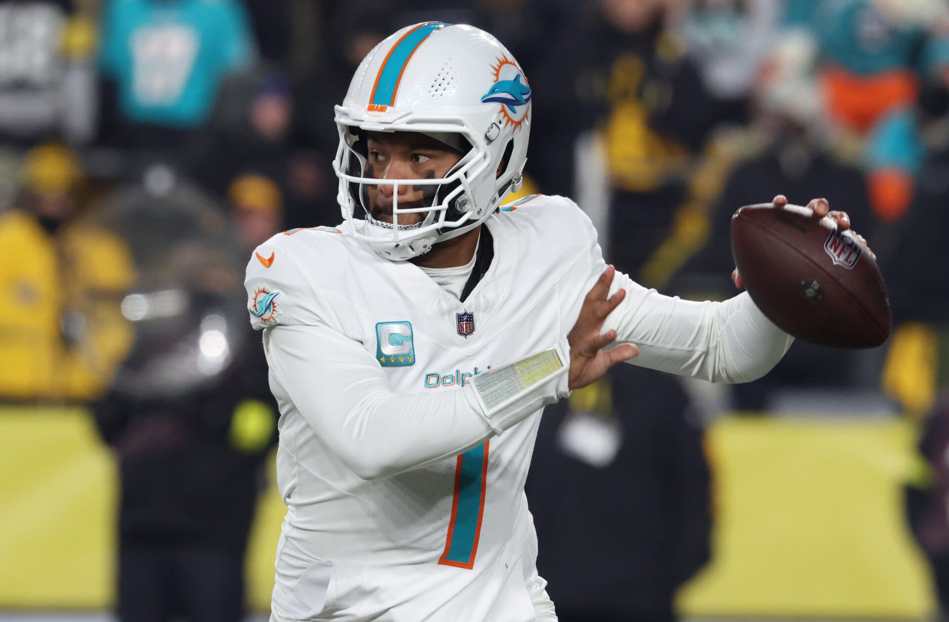 Miami Dolphins quarterback Tua Tagovailoa (1) throws in the first quarter against the Pittsburgh Steelers at Acrisure Stadium.