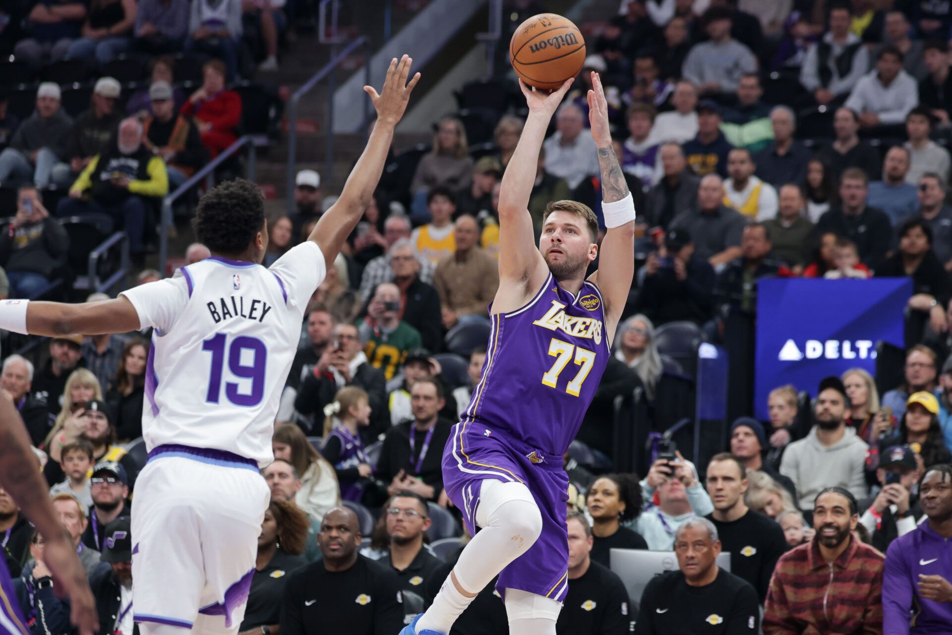 Los Angeles Lakers forward/guard Luka Doncic (77) shoots over Utah Jazz forward Ace Bailey (19) during the first quarter at Delta Center.