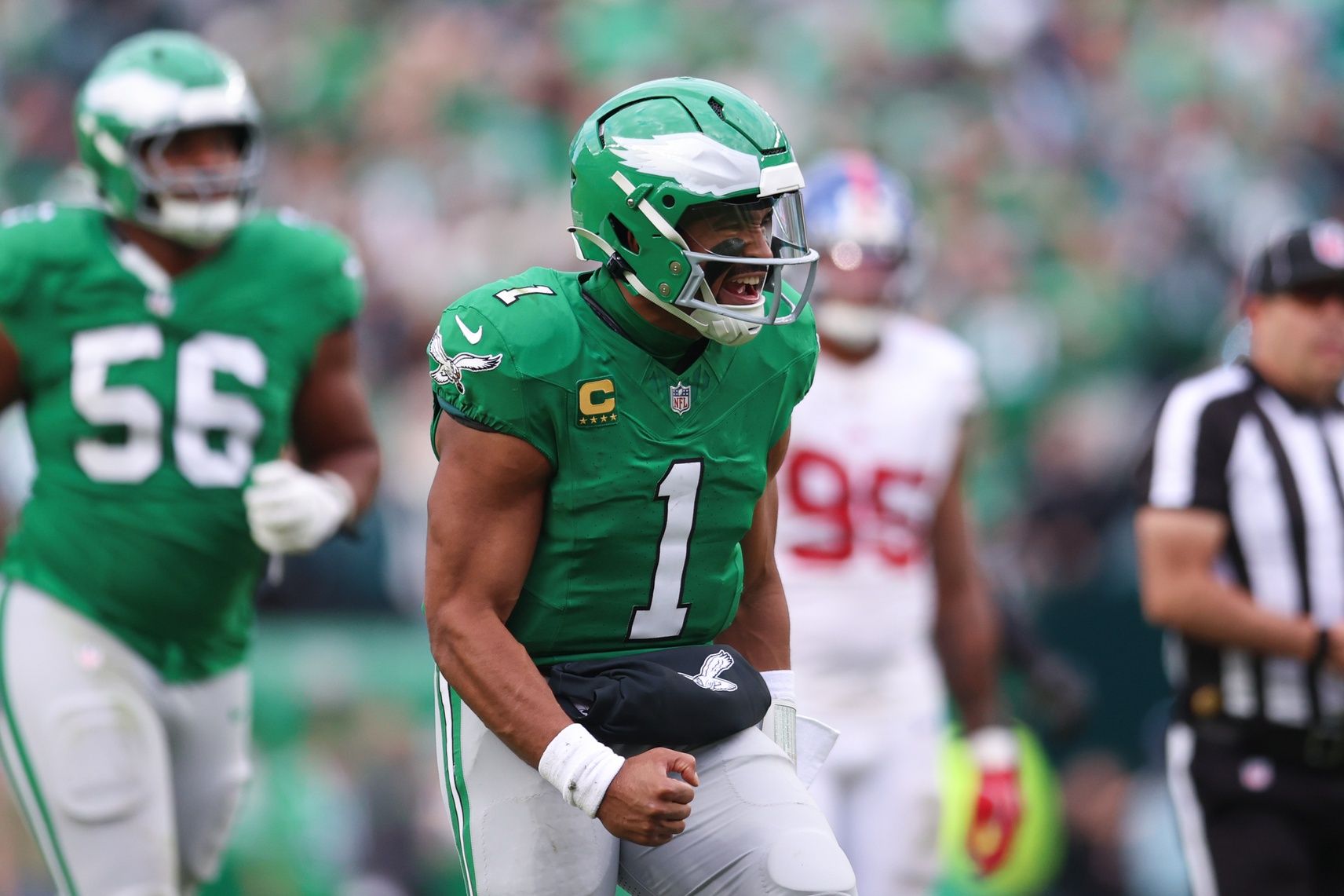 Philadelphia Eagles quarterback Jalen Hurts (1) reacts after  his touchdown pass against the New York Giants during the fourth quarter at Lincoln Financial Field.