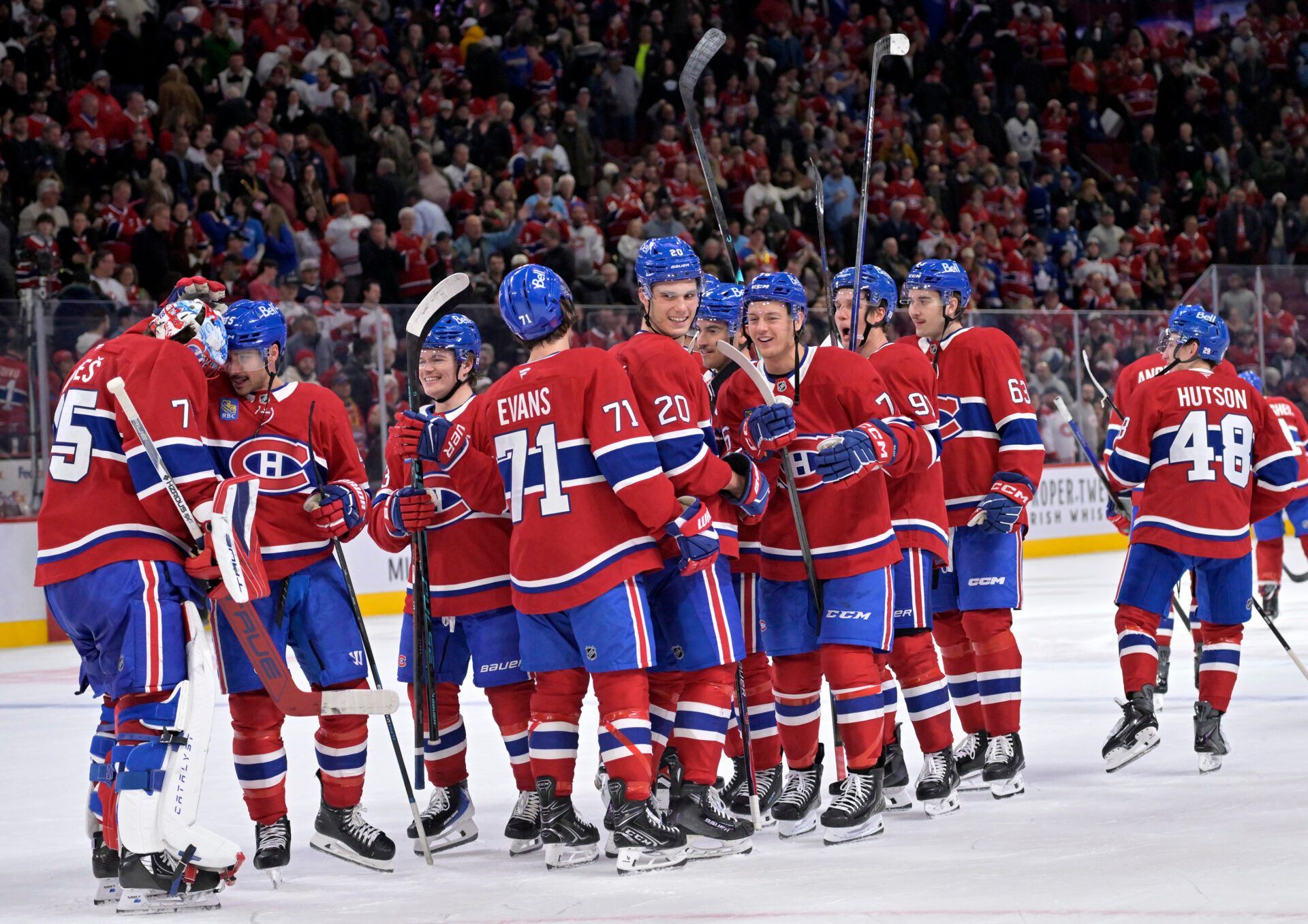 Montreal Canadiens players celebrate the win against the Toronto Maple Leafs at the Bell Centre.