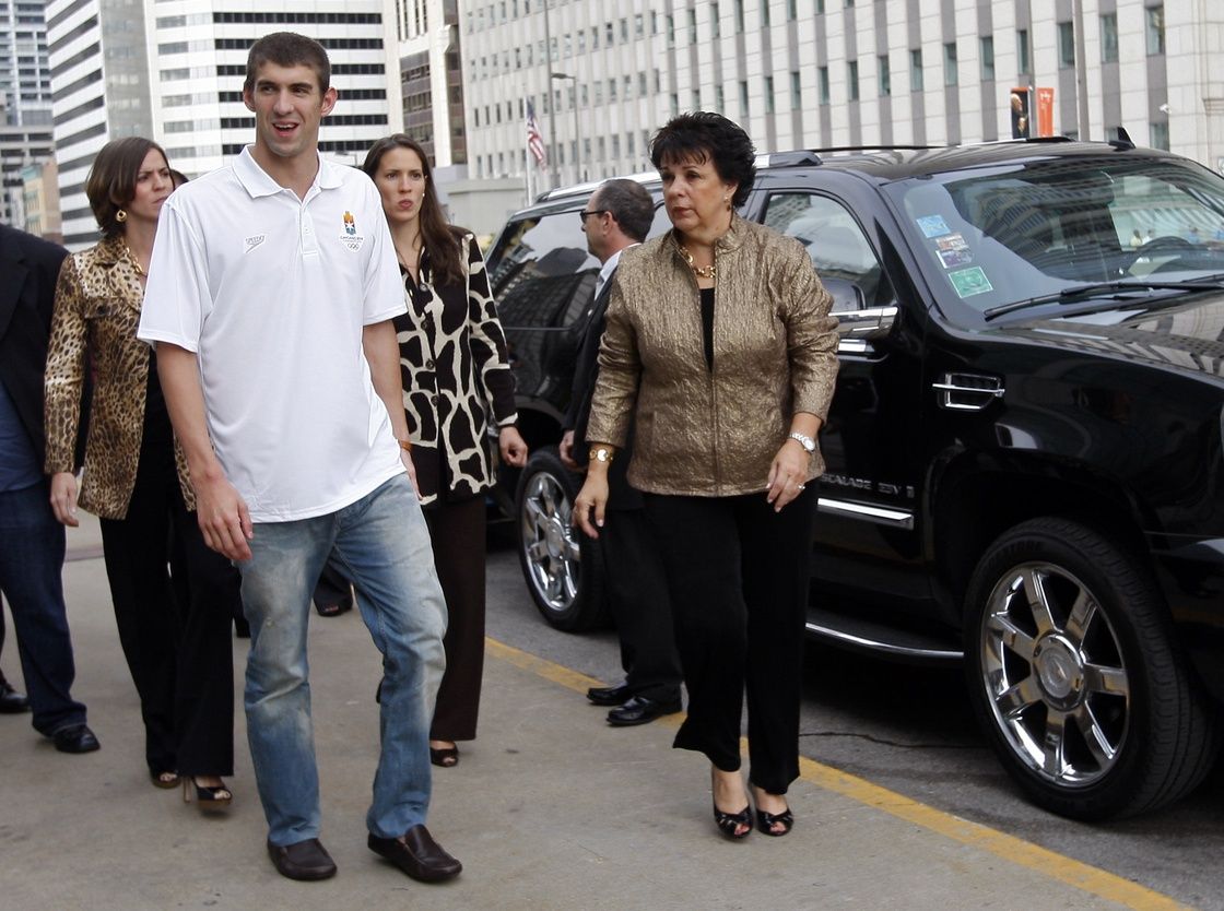 USA swimmer Michael Phelps (left) and his mother Debbie Phelps (right) arrive for the taping of the season premier of the Oprah Winfrey Show at Millennium Park. Over 150 USA Olympic athletes were in Chicago to participate in the taping of the show.