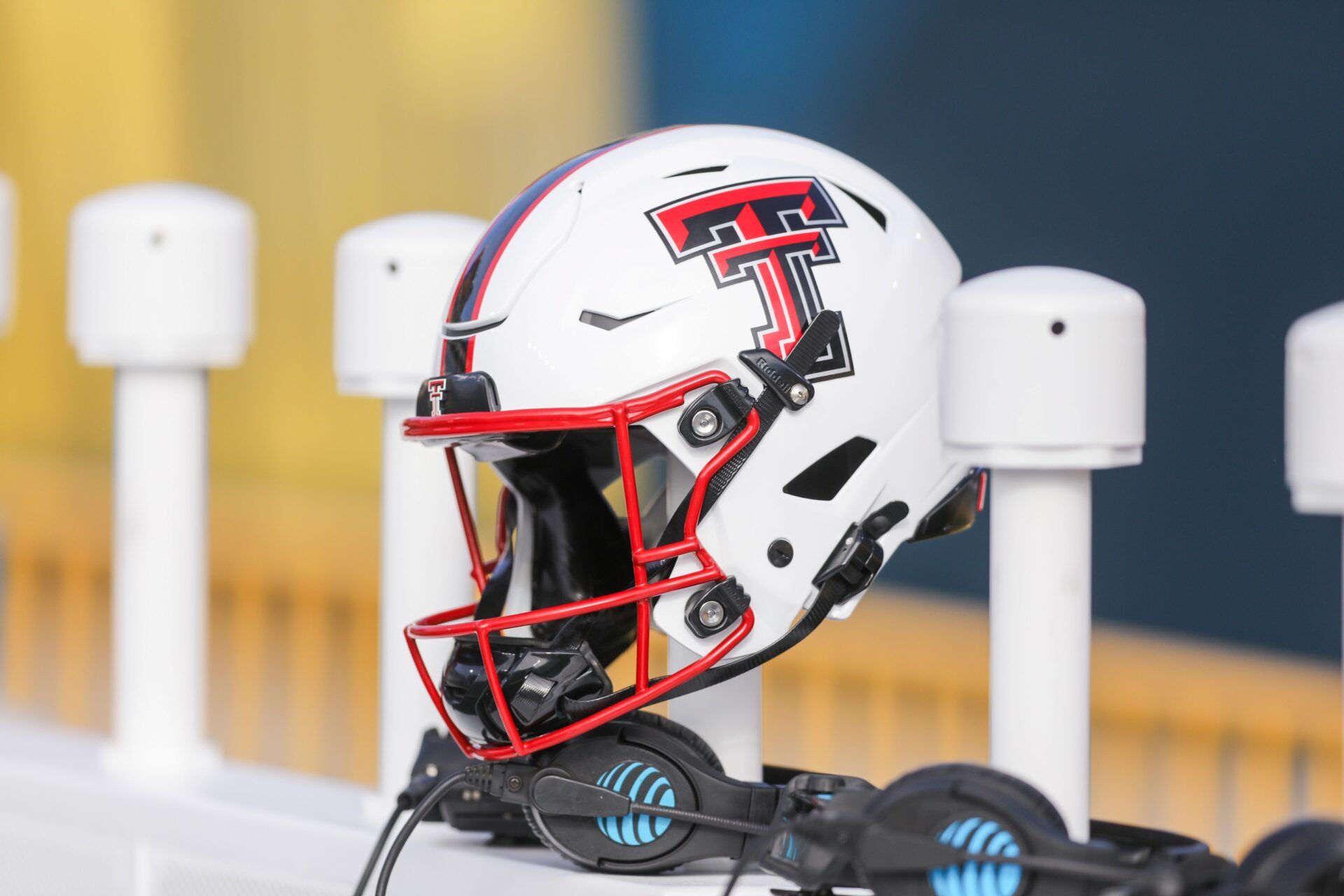 A Texas Tech Red Raiders helmet sits along the bench area during pregame between the West Virginia Mountaineers and the Texas Tech Red Raiders at Milan Puskar Stadium.