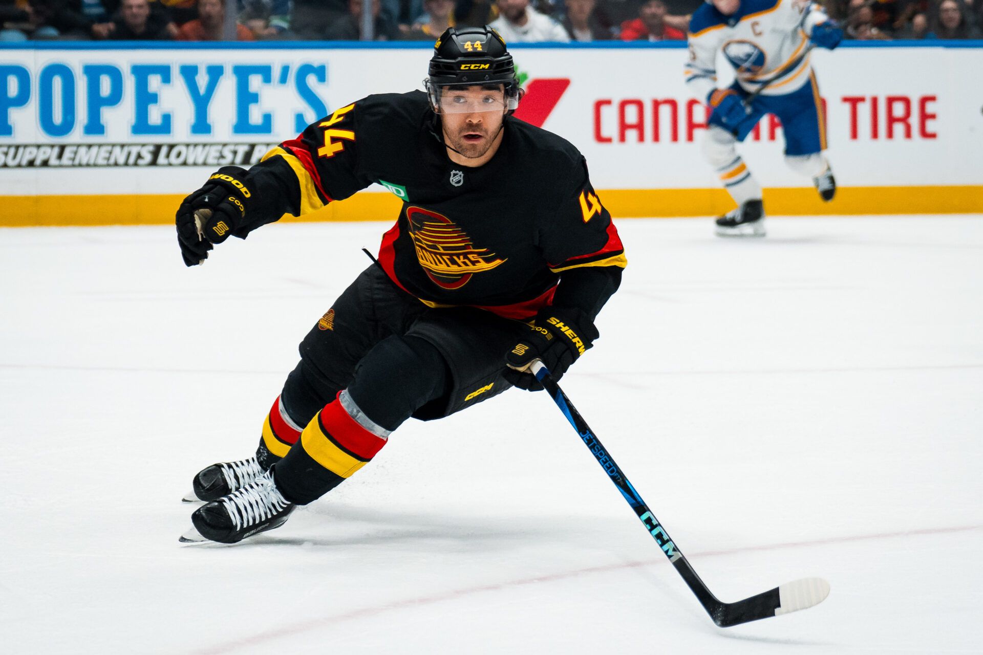Vancouver Canucks forward Kiefer Sherwood (44) skates against the Buffalo Sabres in the first period at Rogers Arena.