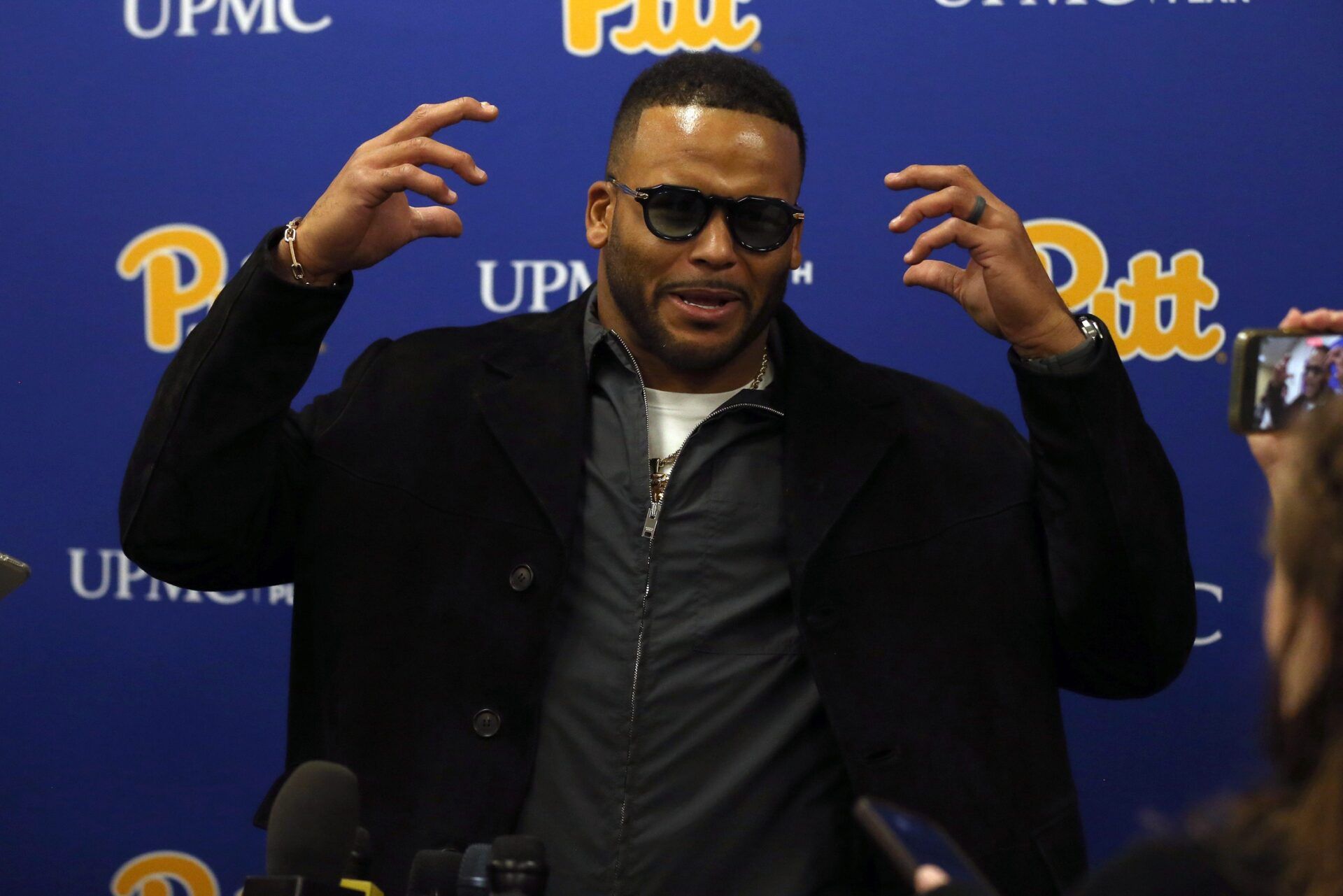 Former Pittsburgh Panther and retired NFL defensive tackle Aaron Donald speaks at a press conference prior to the start of the Pittsburgh Panthers vs Notre Dame Fighting Irish game at Acrisure Stadium in Pittsburgh, PA on November 15, 2025.