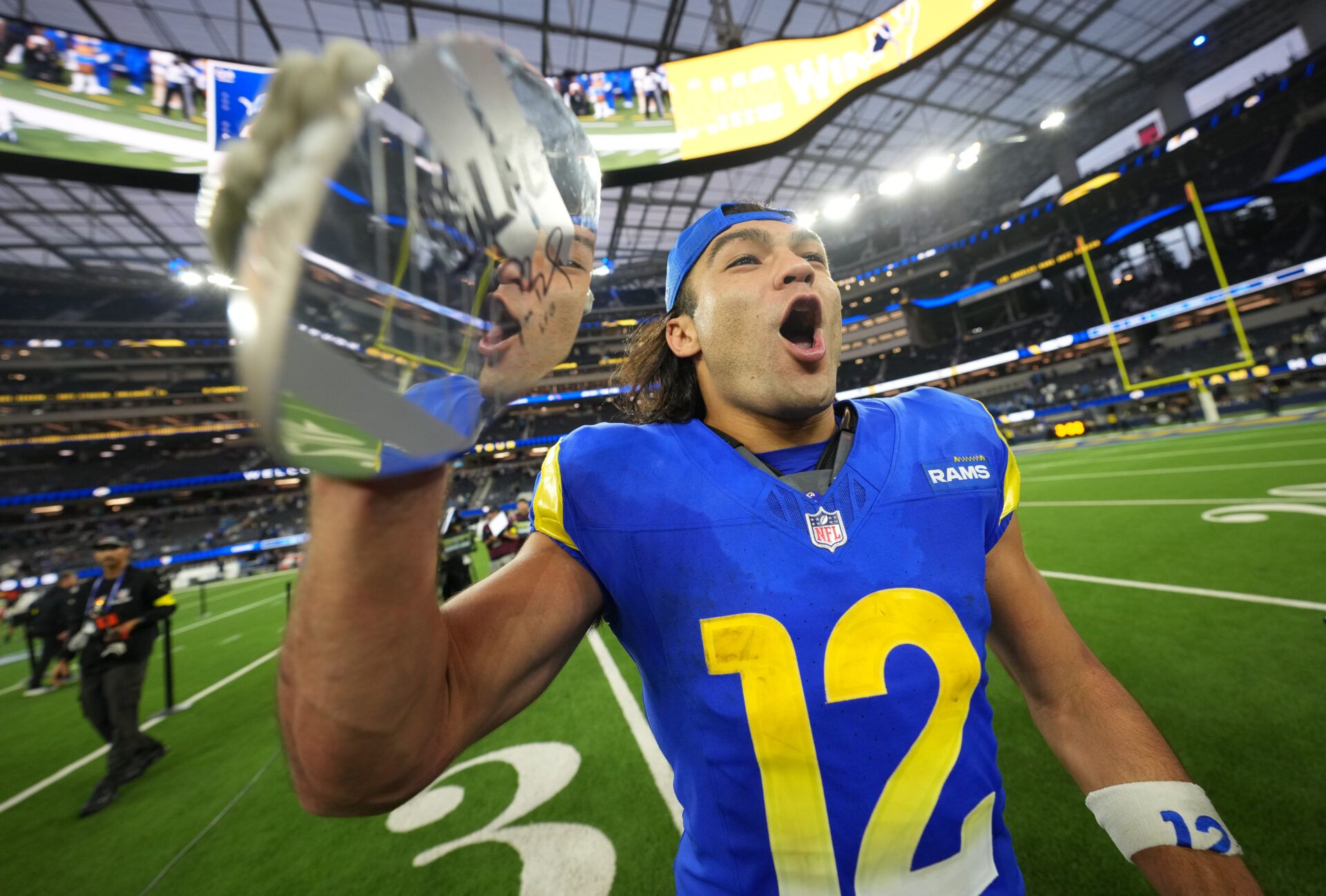 Los Angeles Rams wide receiver Puka Nacua (12) celebrates after defeating the Detroit Lions at SoFi Stadium.
