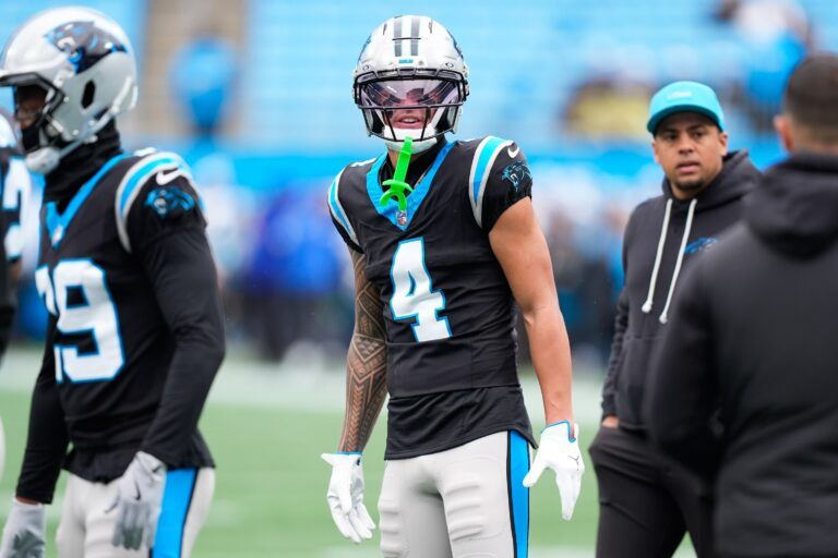 Carolina Panthers wide receiver Tetairoa McMillan (4) looks on before the game against the Los Angeles Rams at Bank of America Stadium.