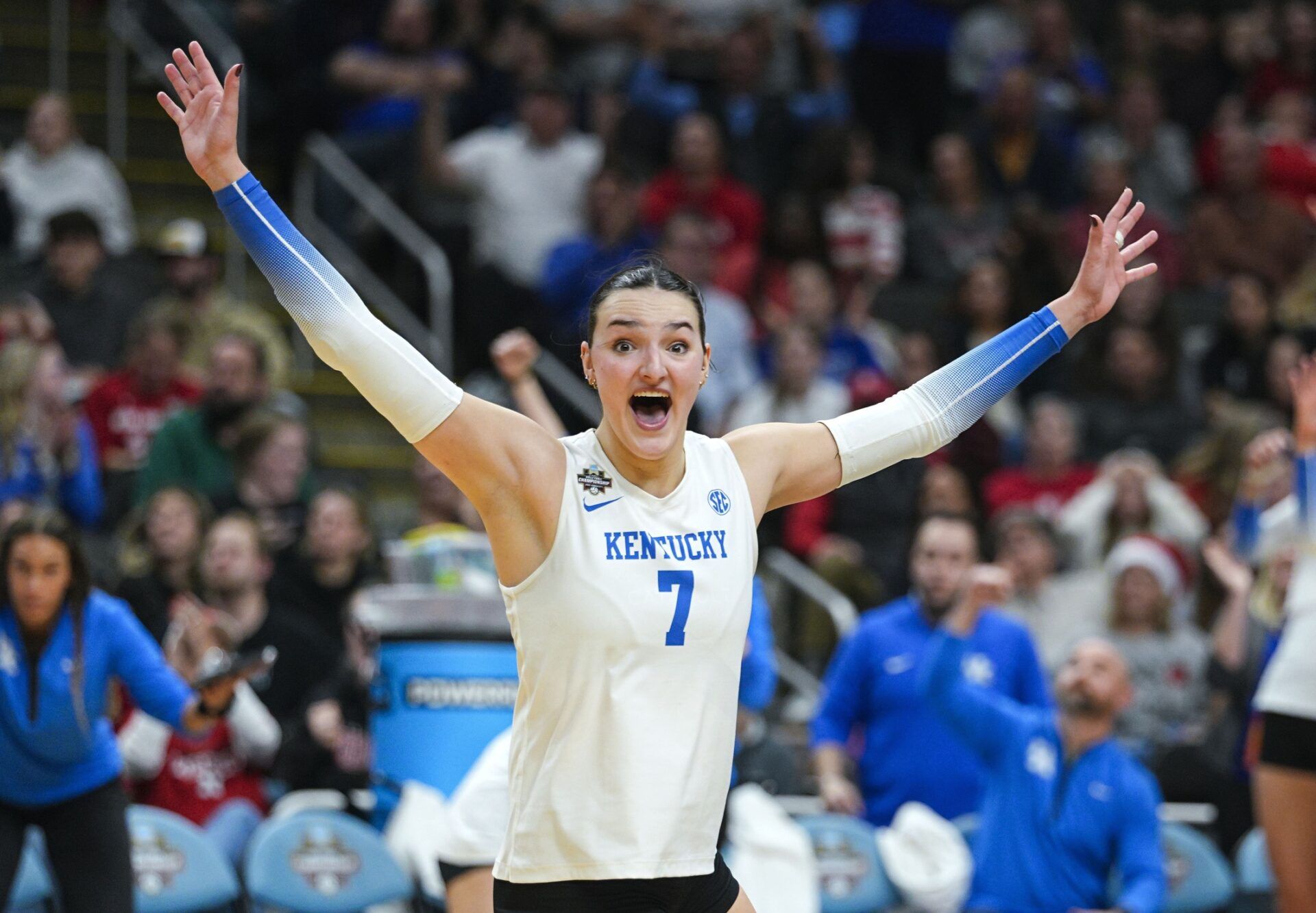 Kentucky Wildcats outside hitter Eva Hudson (7) celebrates after a point during the fourth set against the Wisconsin Badgers in a 2025 NCAA Women’s Volleyball Championship semifinal match at T-Mobile Center.