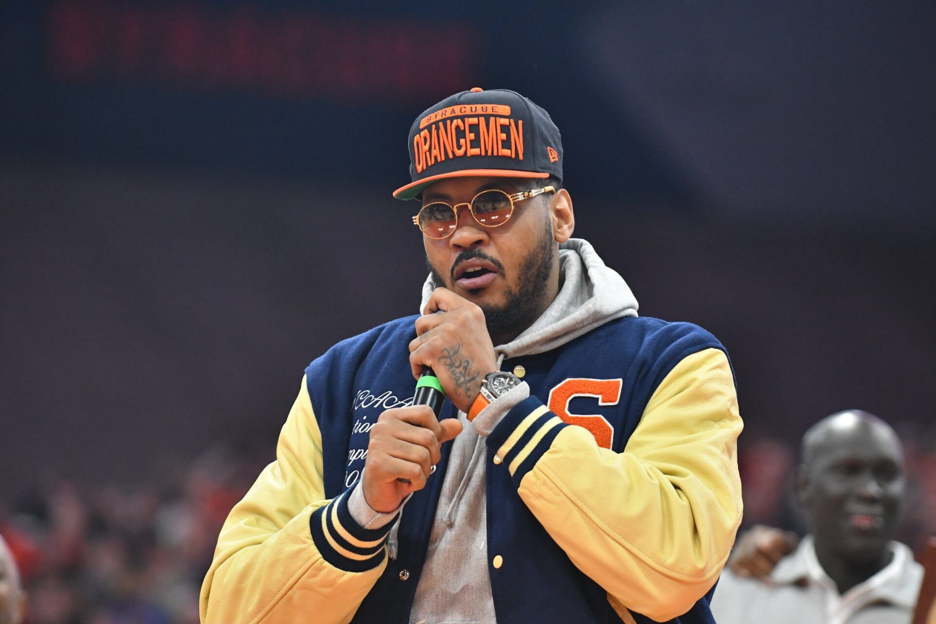 Former Syracuse Orange member of the 2003 National Championship team Carmello Anthony addresses the crowd at the half as the university celebrates the 20th anniversary at JMA Wireless Dome.