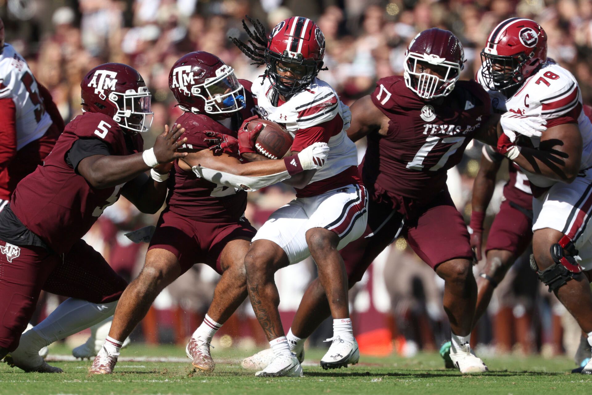 Texas A&M Aggies linebacker Taurean York (21) tackles South Carolina Gamecocks running back Rahsul Faison (1) during the third quarter at Kyle Field.