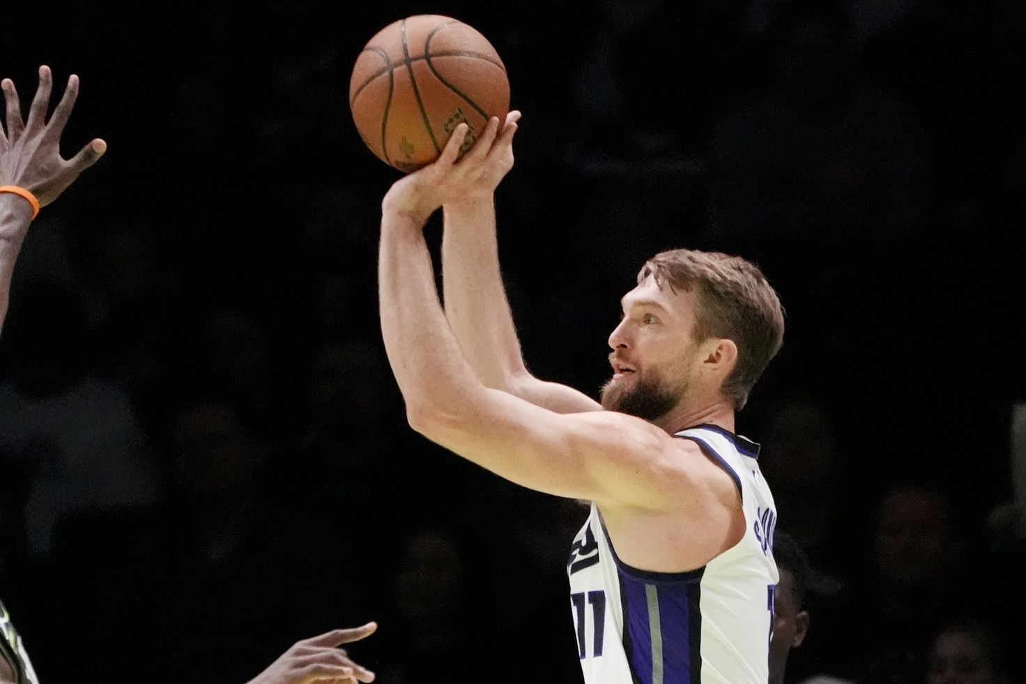 Sacramento Kings center Domantas Sabonis (11) shoots against the Minnesota Timberwolves in the first quarter at Target Center.