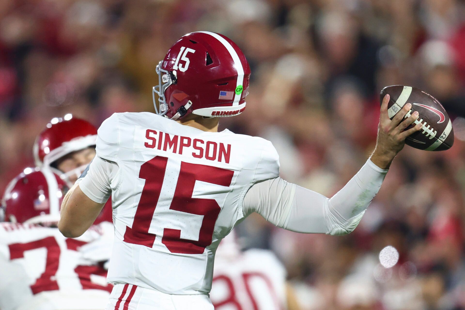 Alabama Crimson Tide quarterback Ty Simpson (15) throws a pass in the first half against the Oklahoma Sooners at Gaylord Family OK Memorial Stadium.