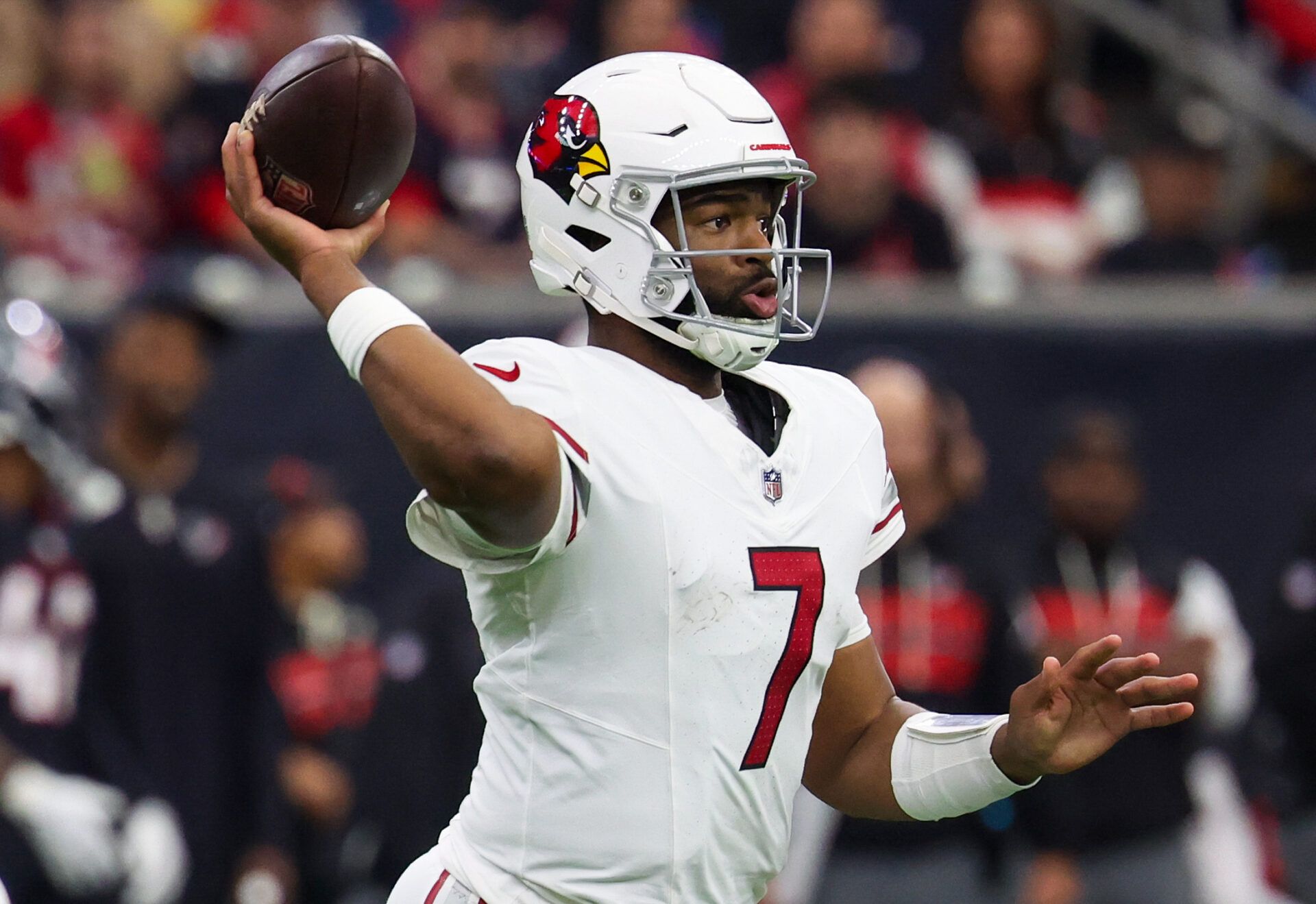 Arizona Cardinals quarterback Jacoby Brissett (7) drops back to pass against the Houston Texans in the third quarter at NRG Stadium.
