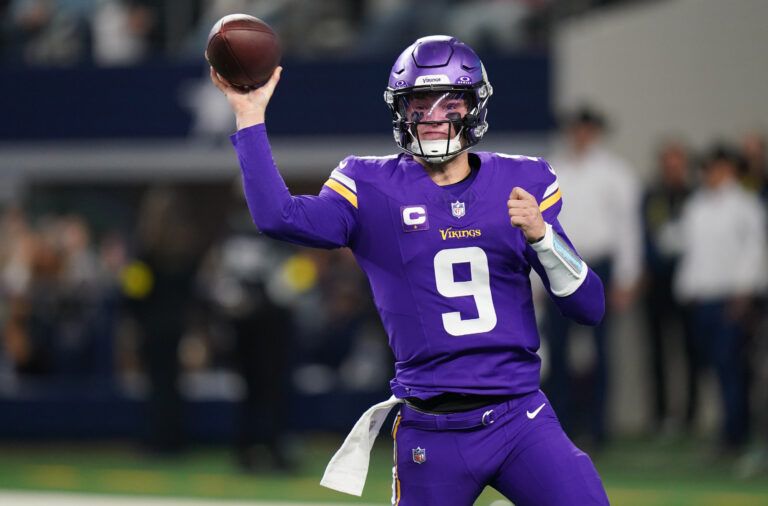 Minnesota Vikings quarterback J.J. McCarthy (9) throws during the first half against the Dallas Cowboys at AT&T Stadium.