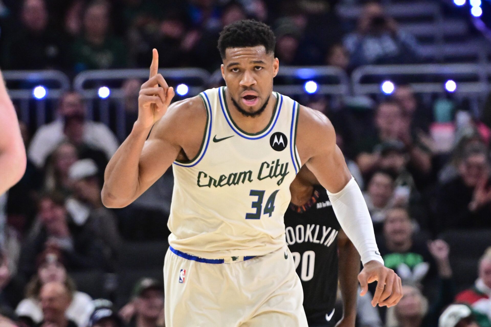 Milwaukee Bucks forward Giannis Antetokounmpo (34) reacts after scoring his 21,000th career point in the third quarter against the Brooklyn Nets at Fiserv Forum.