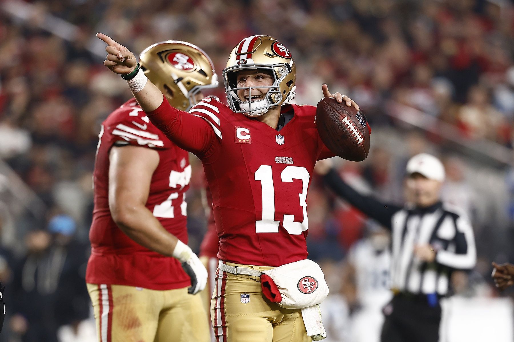 San Francisco 49ers quarterback Brock Purdy (13) reacts against the Carolina Panthers during the first half at Levi's Stadium.
