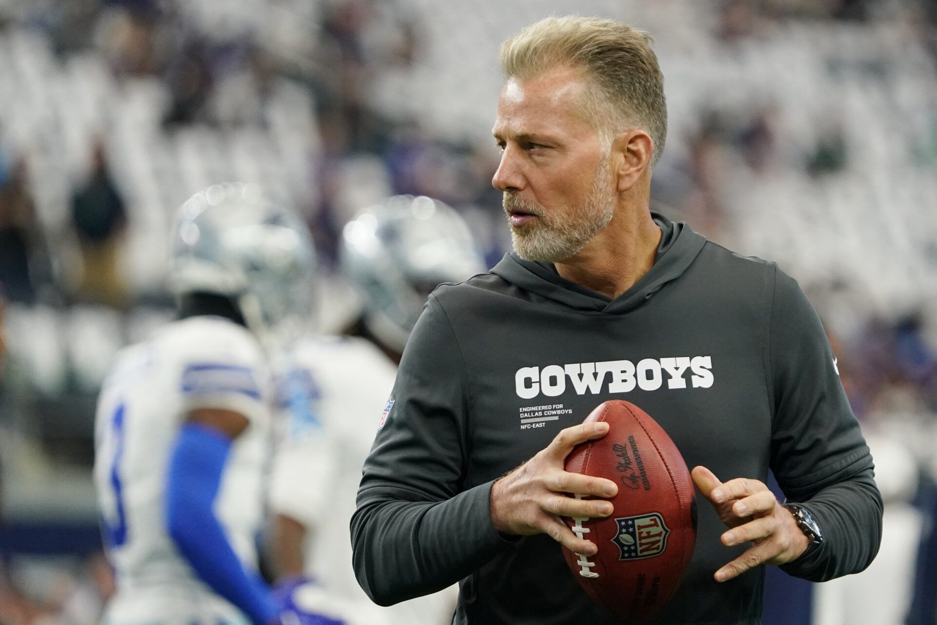 Dallas Cowboys defensive coordinator Matt Eberflus looks on during warmups before the game against the New York Giants at AT&T Stadium.