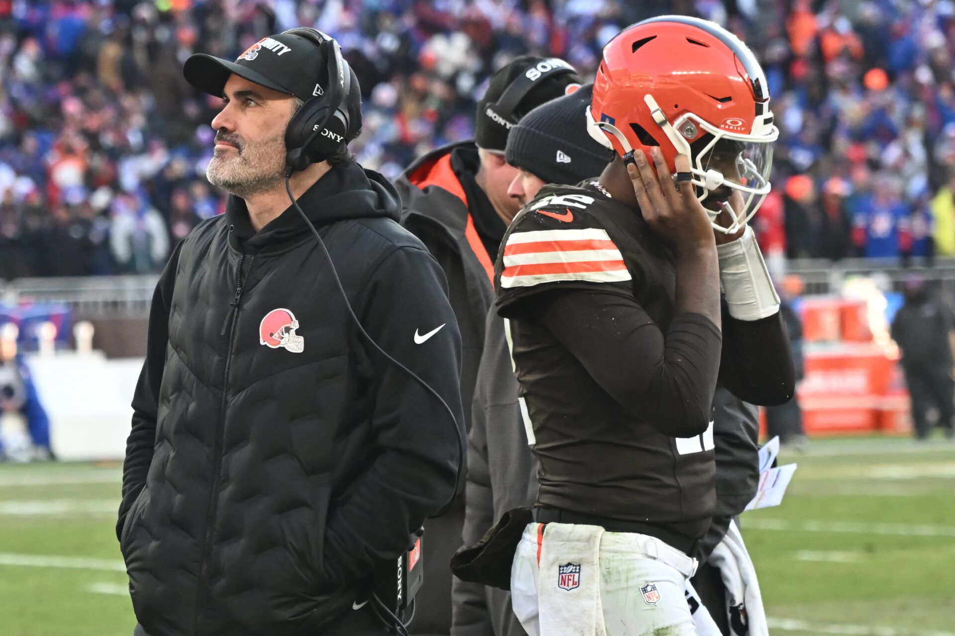 Cleveland Browns head coach Kevin Stefanski and quarterback Shedeur Sanders (12) on the sidelines against the Buffalo Bills during the second half at Huntington Bank Field.