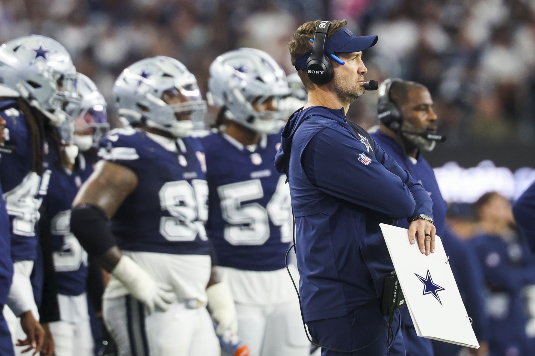 Dallas Cowboys head coach Brian Schottenheimer stands on the sideline during the second quarter against the Los Angeles Chargers at AT&T Stadium.