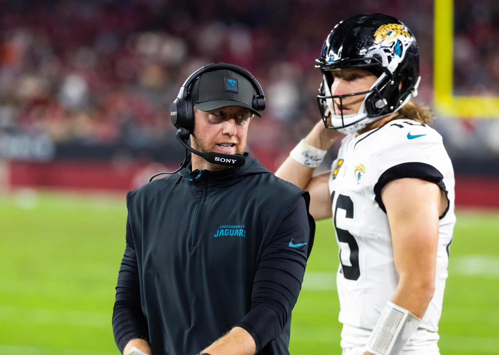 Jacksonville Jaguars head coach Liam Coen with quarterback Trevor Lawrence (16) against the Arizona Cardinals at State Farm Stadium.