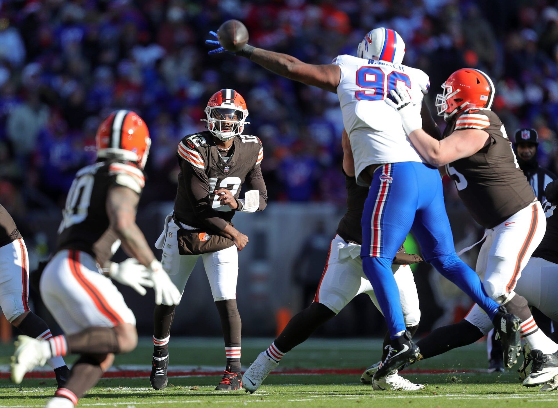Cleveland Browns quarterback Shedeur Sanders (12) tries for a pass to running back Quinshon Judkins (10) during the first half of an NFL football game against the Buffalo Bills at Huntington Bank Field, Dec. 21, 2025, in Cleveland, Ohio.