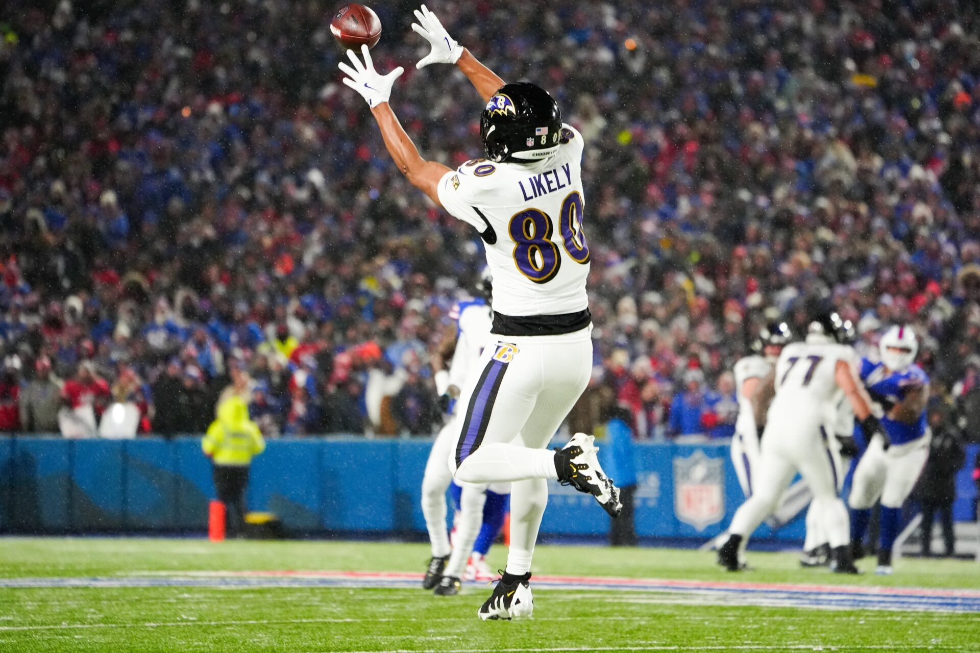 Baltimore Ravens tight end Isaiah Likely (80) makes a catch during the first quarter against the Buffalo Bills in a 2025 AFC divisional round game at Highmark Stadium.