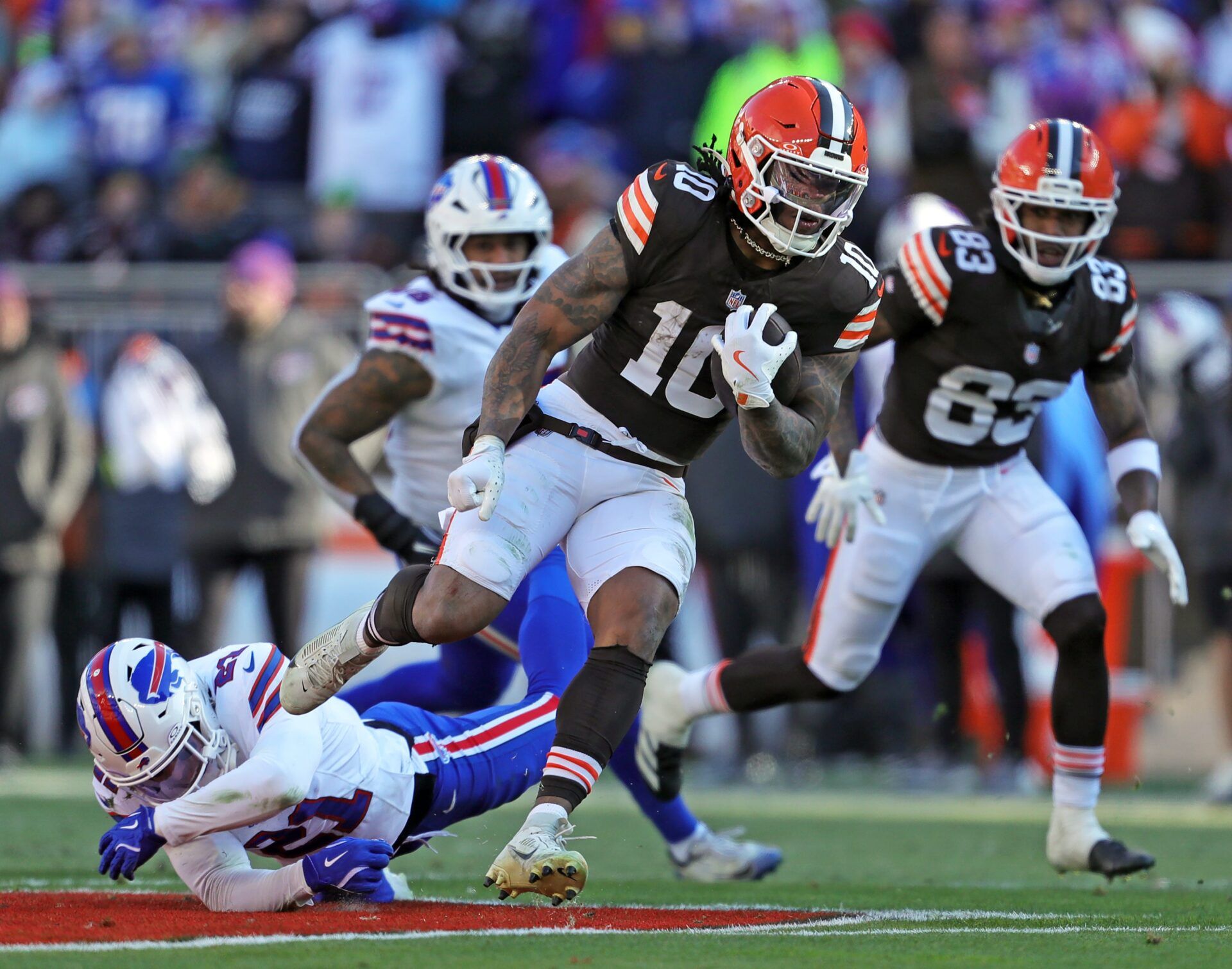 Cleveland Browns running back Quinshon Judkins (10) rushes for yards against the Buffalo Bills on Dec. 21, 2025, in Cleveland.