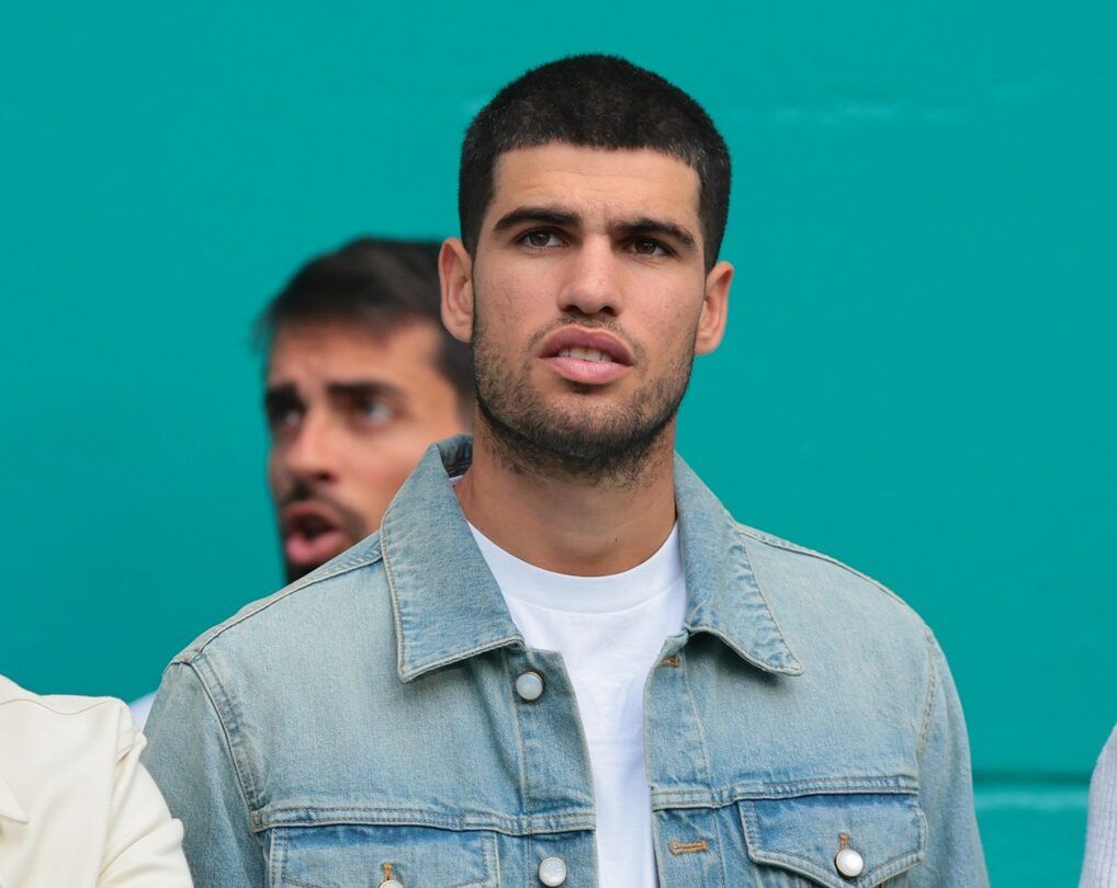 Carlos Alcaraz (right) the current world number one men's tennis player takes in the NFL game between the Miami Dolphins and New Orleans Saints during the second half at Hard Rock Stadium.