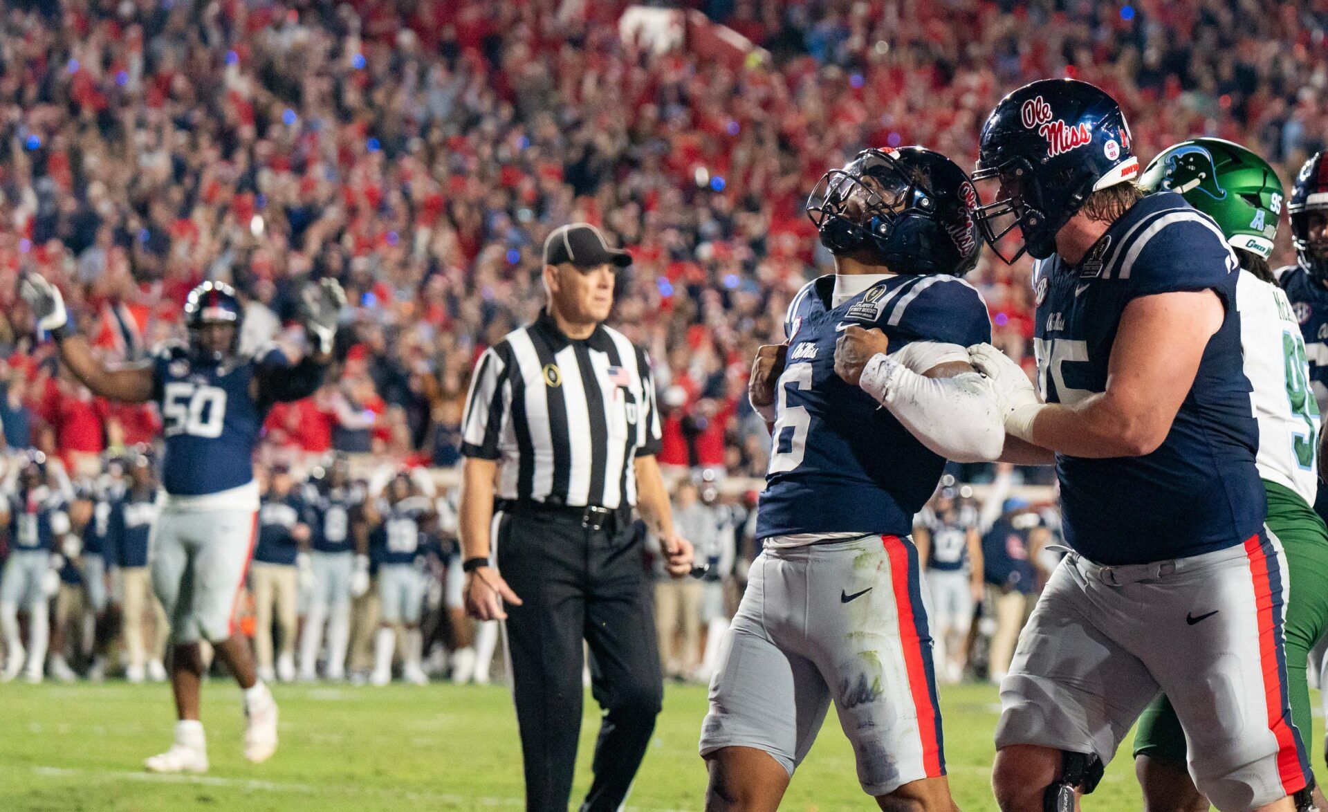 Ole Miss quarterback Trinidad Chambliss (6) celebrates his touchdown during the first round of the College Football Playoff against Tulane at Vaught-Hemingway Stadium in Oxford, Miss., on Saturday, Dec. 20, 2025.