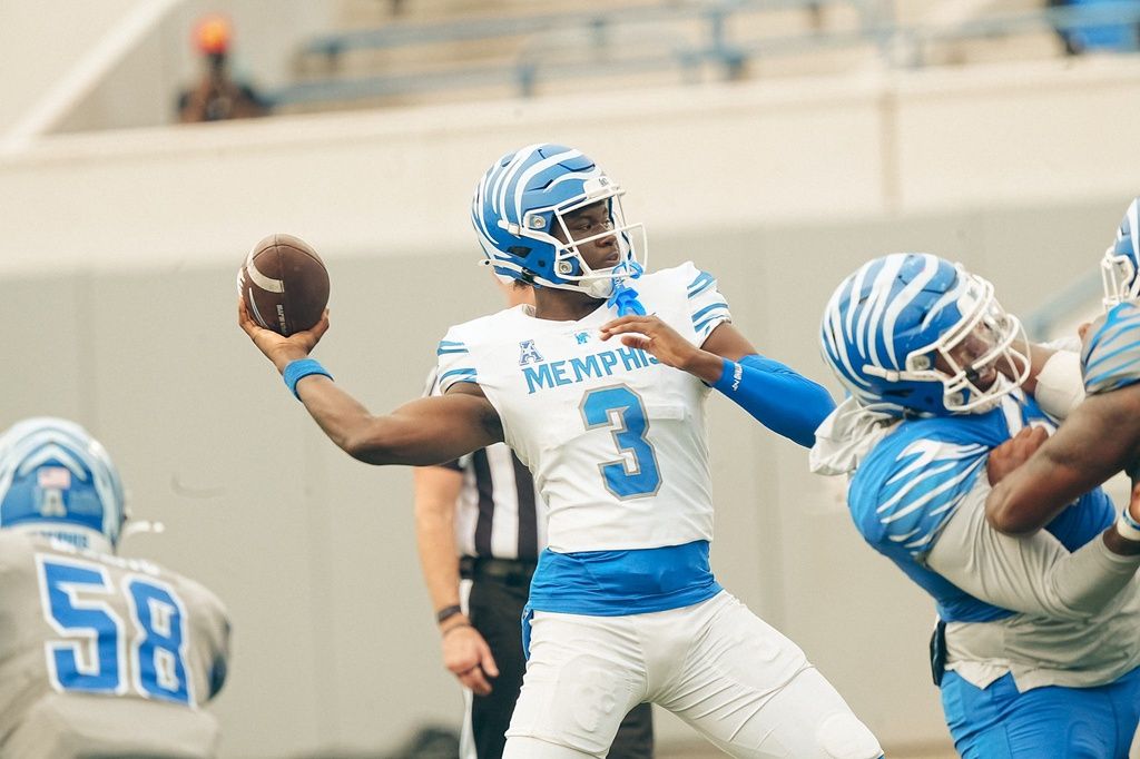 Quarterback AJ Hill (3) looks to throw the ball during a Memphis Tigers football spring game between the blue and gray team on Saturday, April 26, 2025 at Simmons Liberty Bank Stadium in Memphis, Tenn.