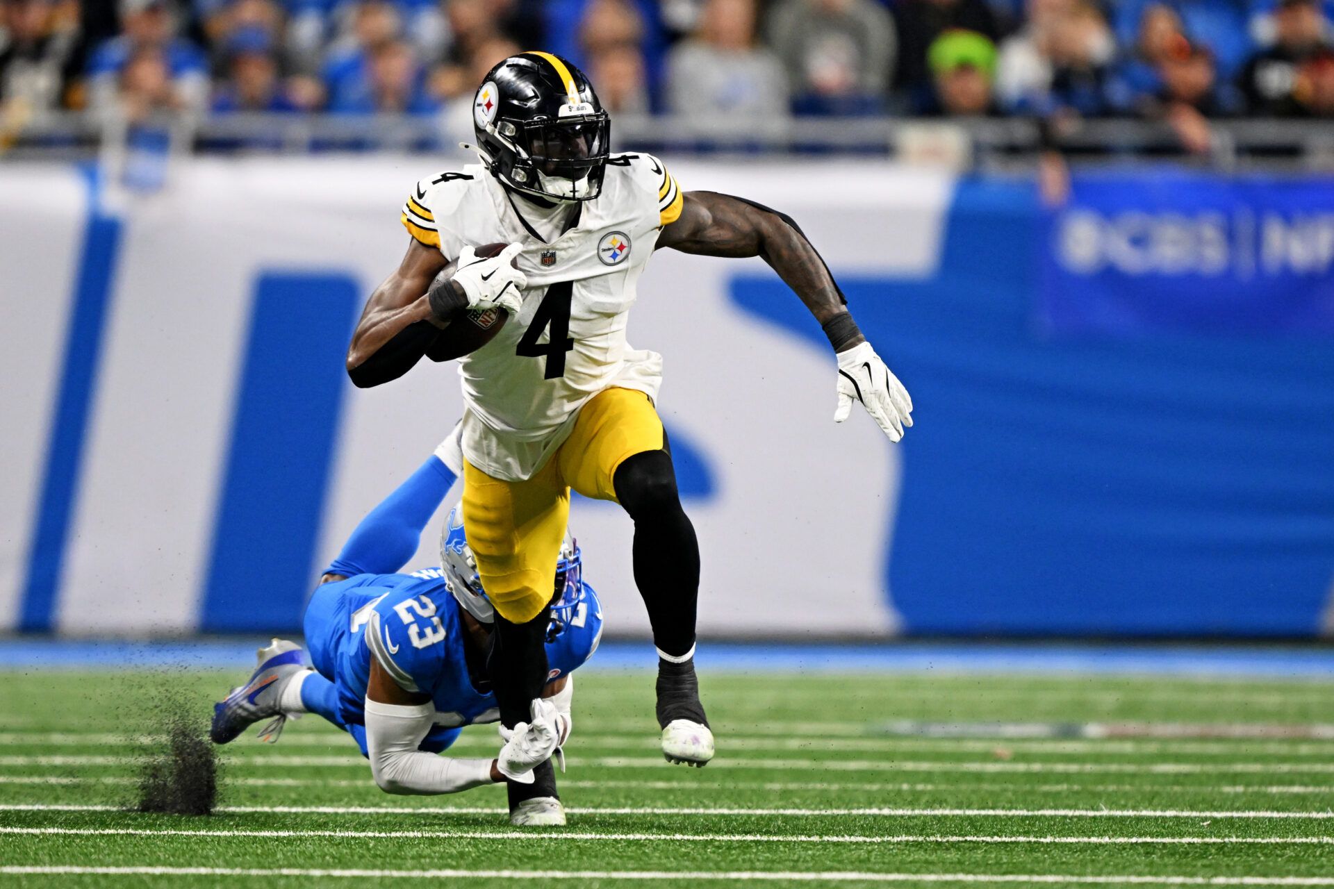 Detroit Lions cornerback Rock Ya-Sin (23) tackles Pittsburgh Steelers wide receiver DK Metcalf (4) during the fourth quarter at Ford Field.