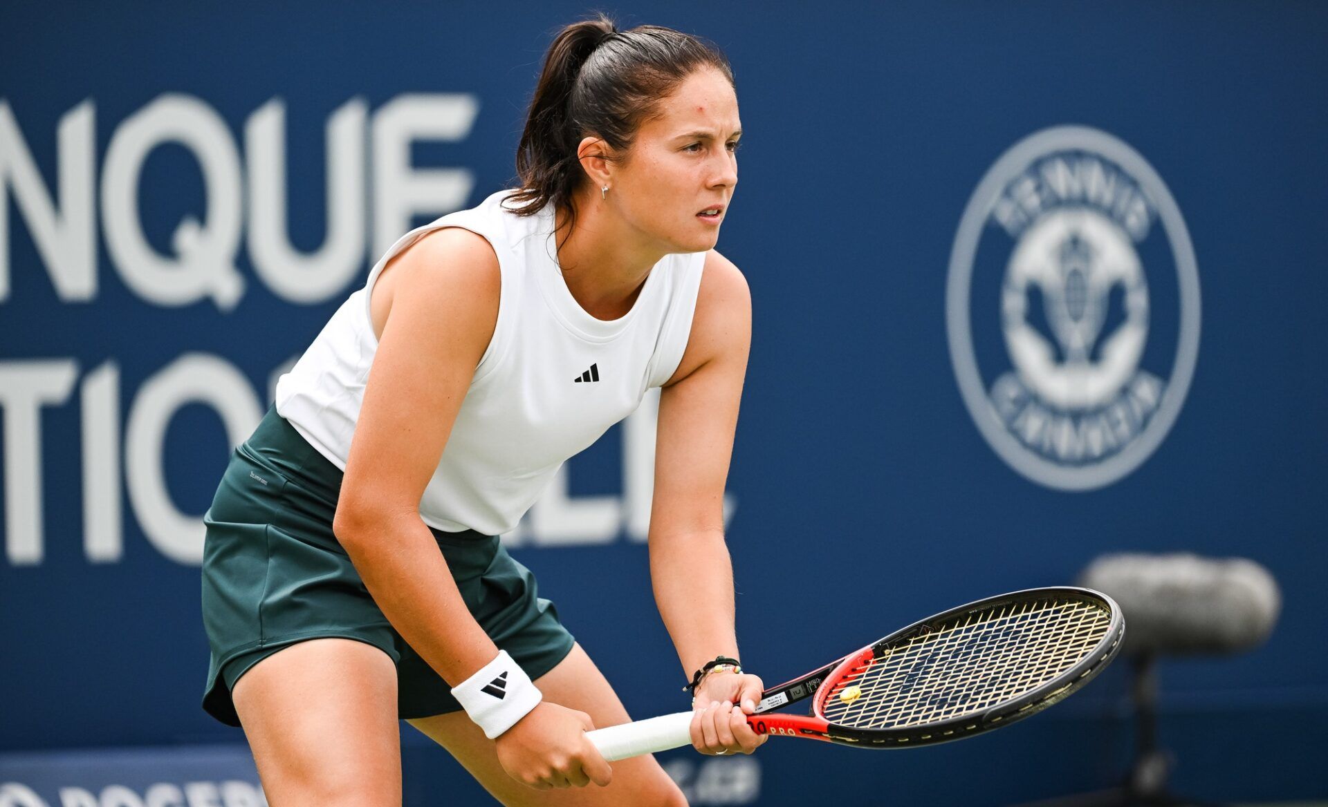 Daria Kasatkina (AUS) waits for Marta Kostyuk (UKR) to serve the ball in third round play at IGA Stadium.