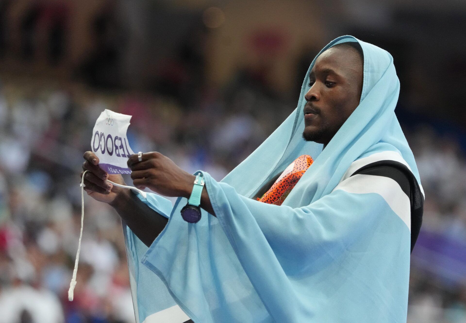 Letsile Tebogo (BOT) celebrates winning the men's 200m final during the Paris 2024 Olympic Summer Games at Stade de France.