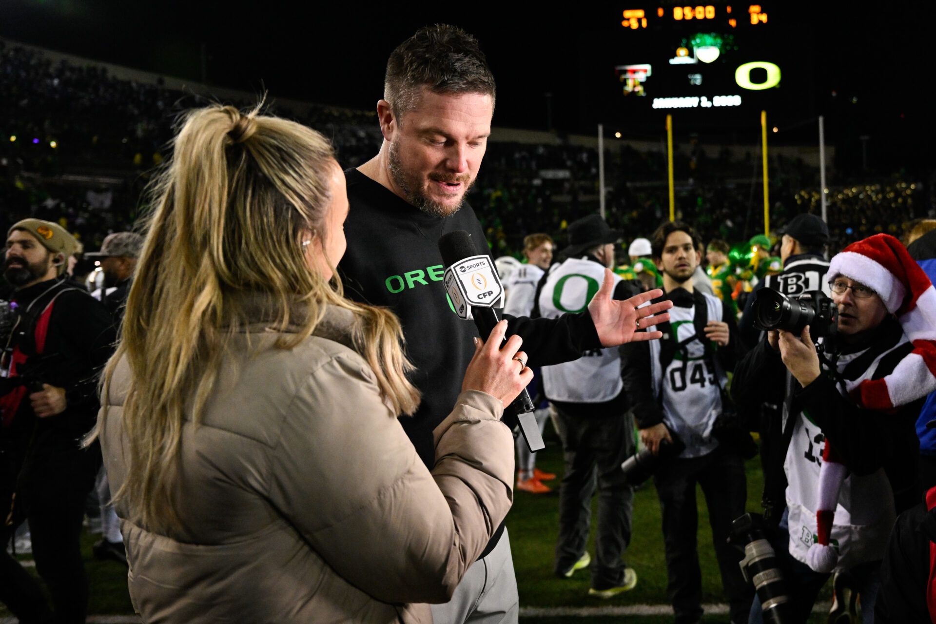 Oregon Ducks head coach Dan Lanning is interviewed after the game against the James Madison Dukes at Autzen Stadium.