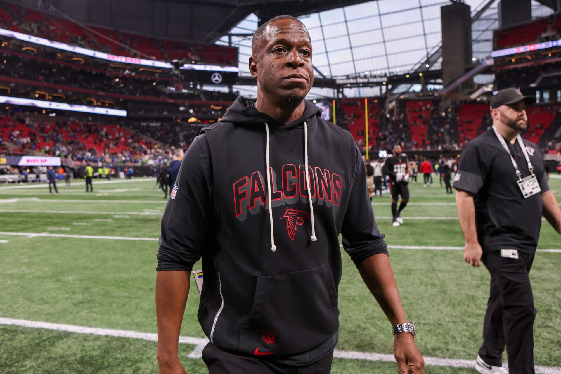 Atlanta Falcons head coach Raheem Morris walks off the fields after a loss to the Seattle Seahawks at Mercedes-Benz Stadium.