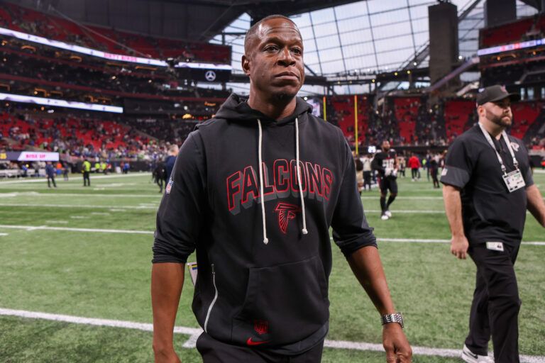 Atlanta Falcons head coach Raheem Morris walks off the fields after a loss to the Seattle Seahawks at Mercedes-Benz Stadium.