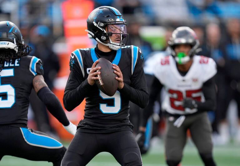 Carolina Panthers quarterback Bryce Young (9) drops to throw during the second half against the Tampa Bay Buccaneers at Bank of America Stadium.
