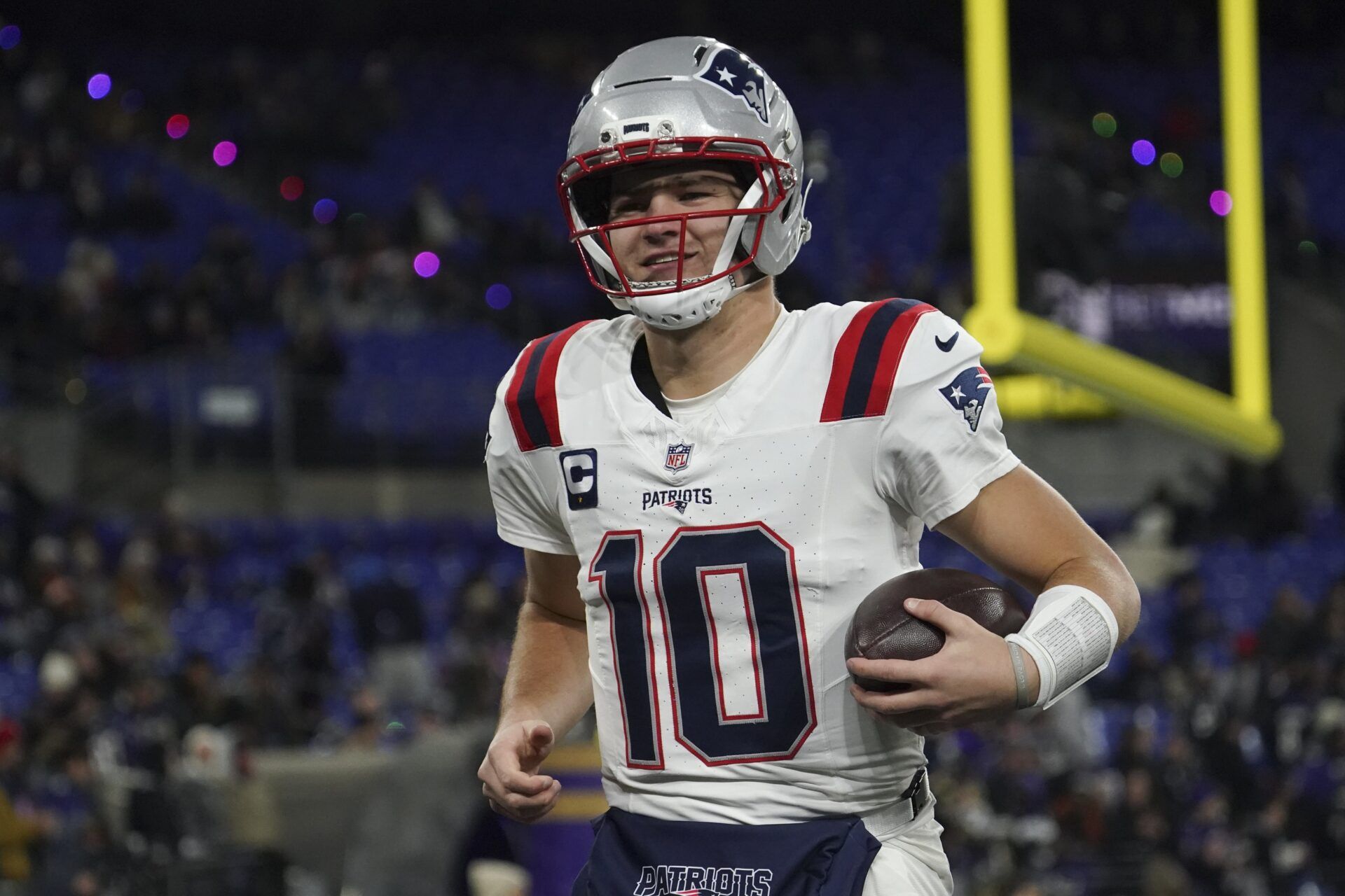 New England Patriots quarterback Drake Maye (10) warms up prior to the game against the Baltimore Ravens at M&T Bank Stadium.