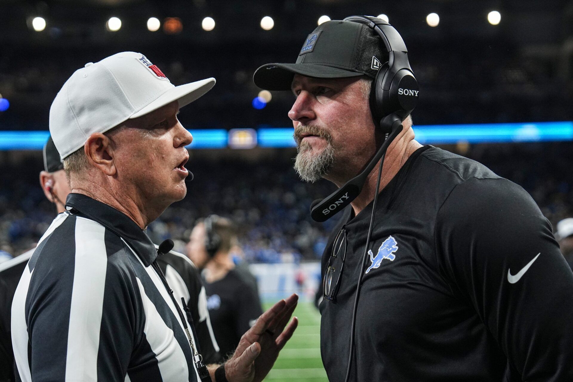 Detroit Lions head coach Dan Campbell talks to referee Carl Cheffers after 29-24 loss to Pittsburgh Steelers at Ford Field in Detroit on Sunday, Dec. 21, 2025.