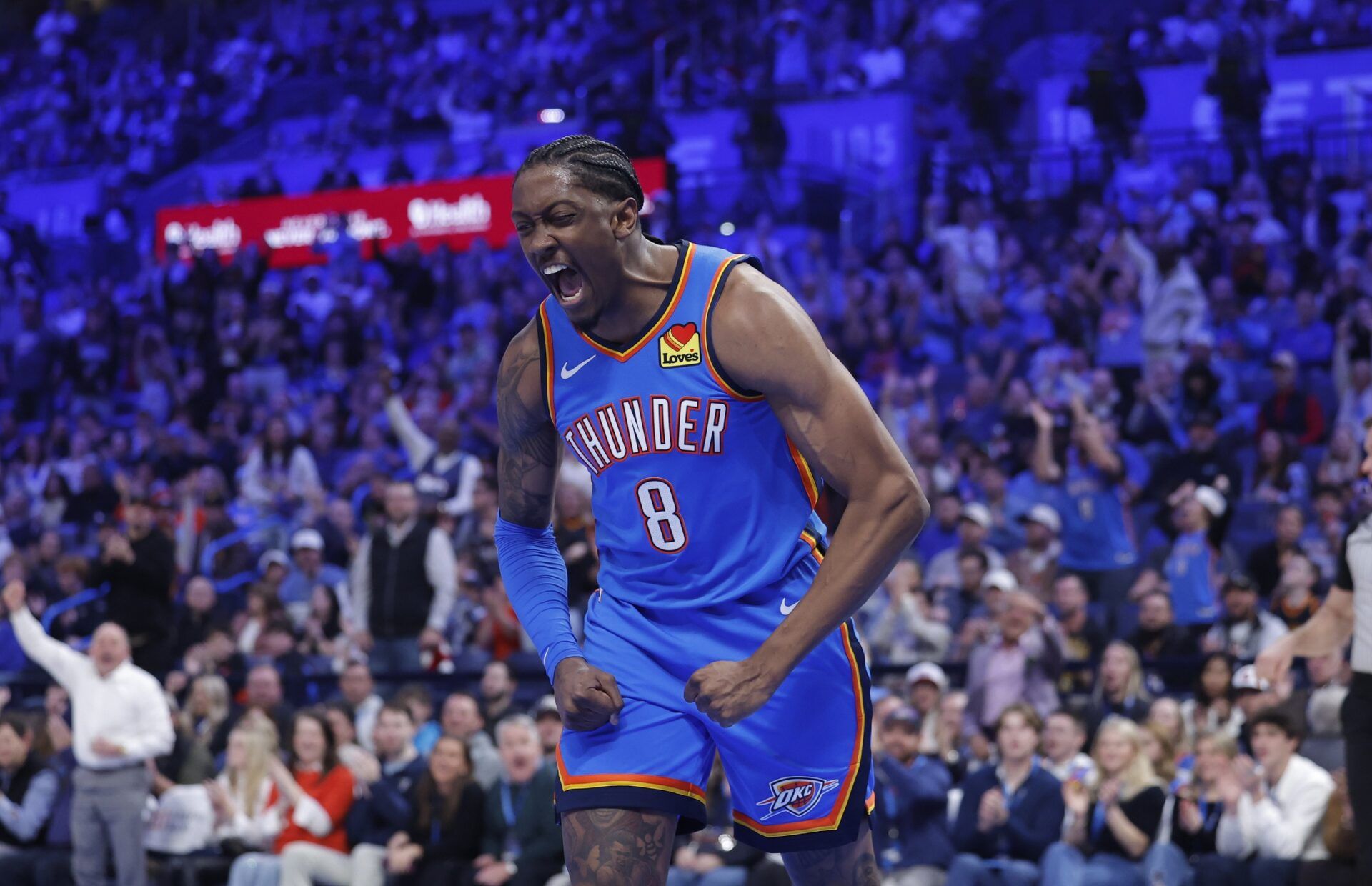 Oklahoma City Thunder guard Jalen Williams (8) screams and celebrates after dunking against the Los Angeles Clippers during the second quarter at Paycom Center.