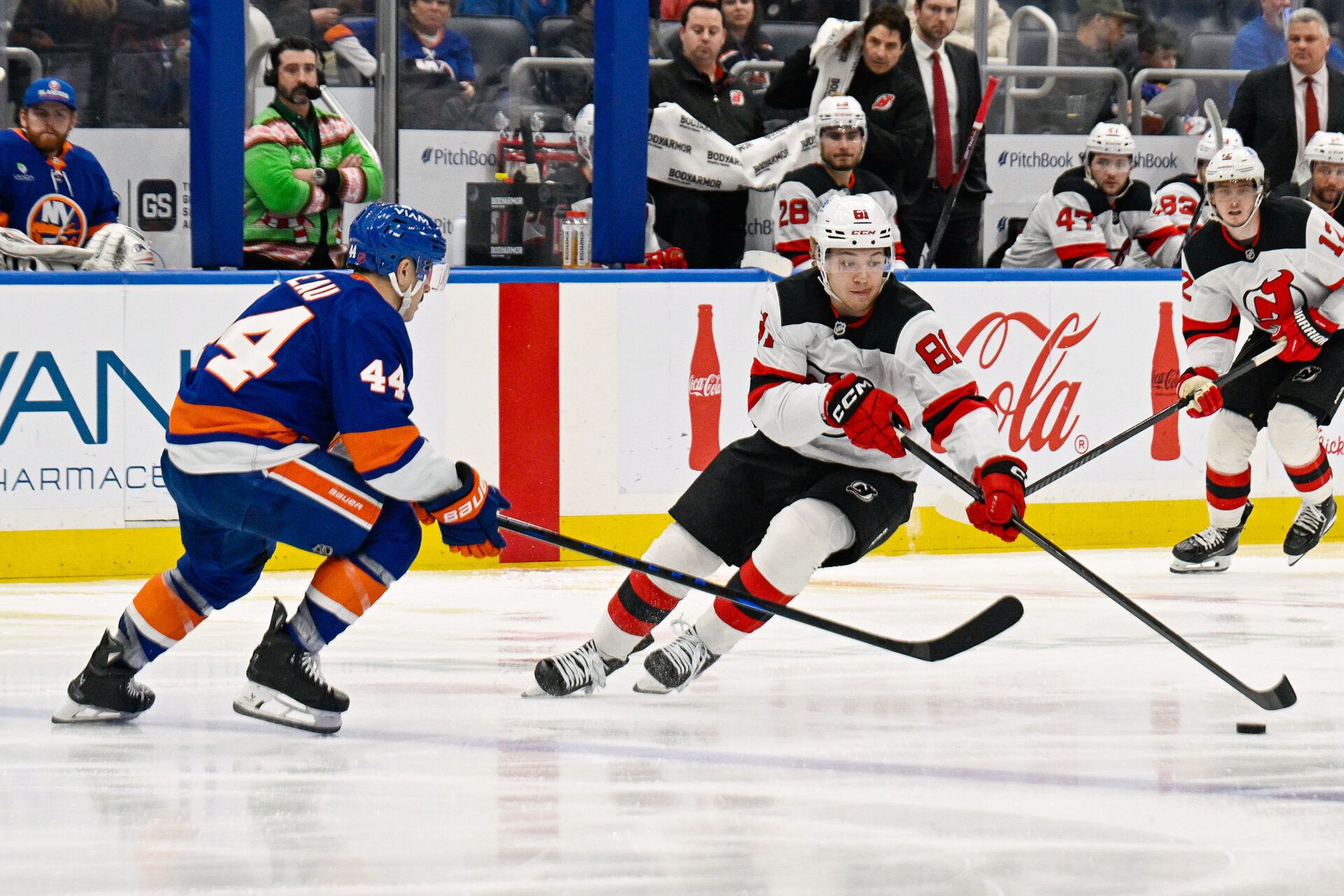 New York Islanders center Jean-Gabriel Pageau (44) defends against New Jersey Devils right wing Arseny Gritsyuk (81) during the third period at UBS Arena.