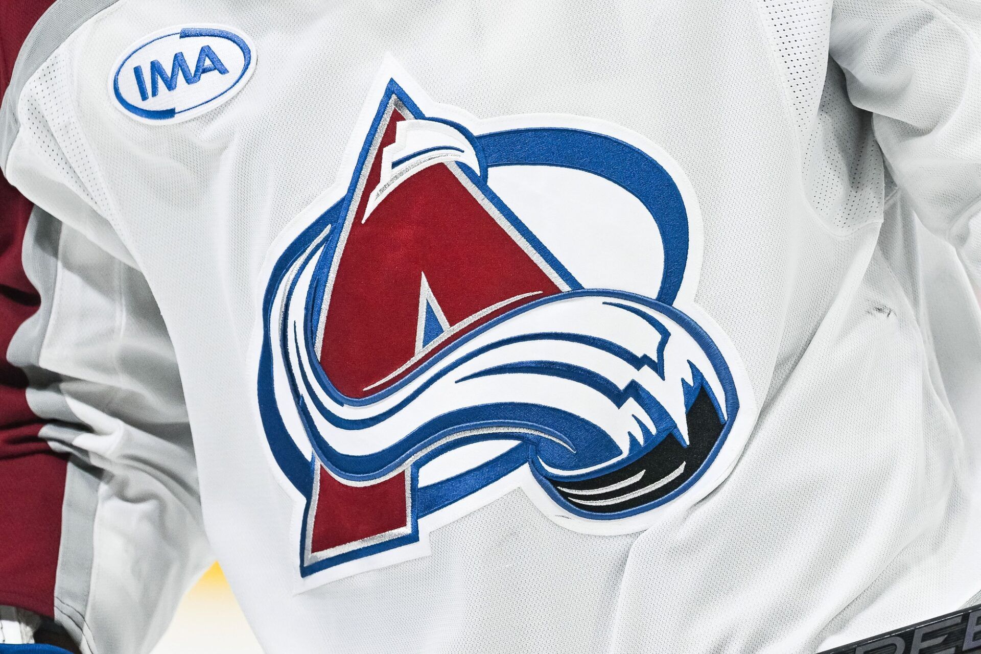 View of a Colorado Avalanche logo on ajersey worn by a member of the team at Bell Centre.