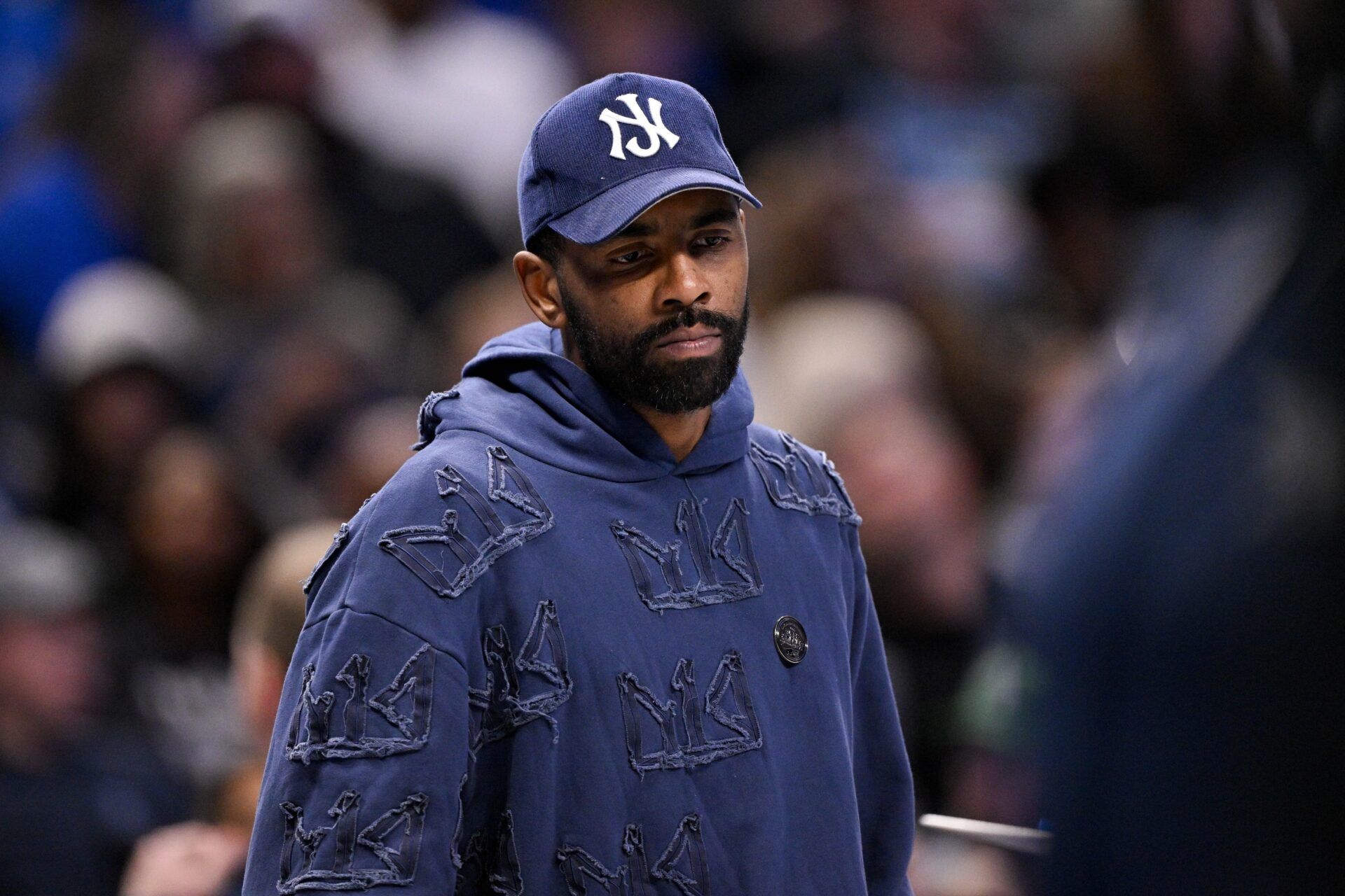 Dallas Mavericks guard Kyrie Irving (11) looks on during the second half against the Memphis Grizzlies at the American Airlines Center.
