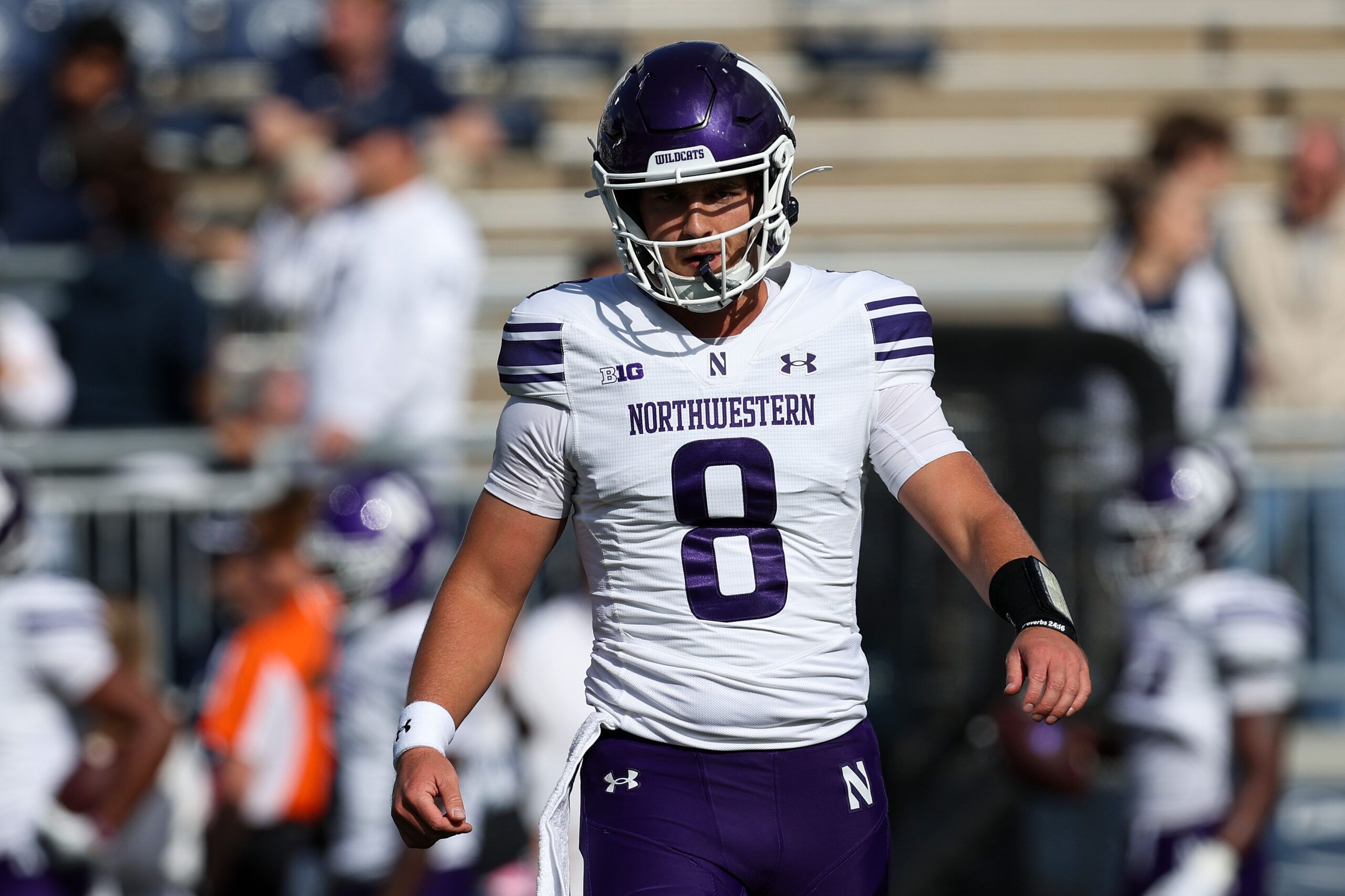 Northwestern Wildcats quarterback Preston Stone (8) walks on the field during a warmup prior to the game against the Penn State Nittany Lions at Beaver Stadium.
