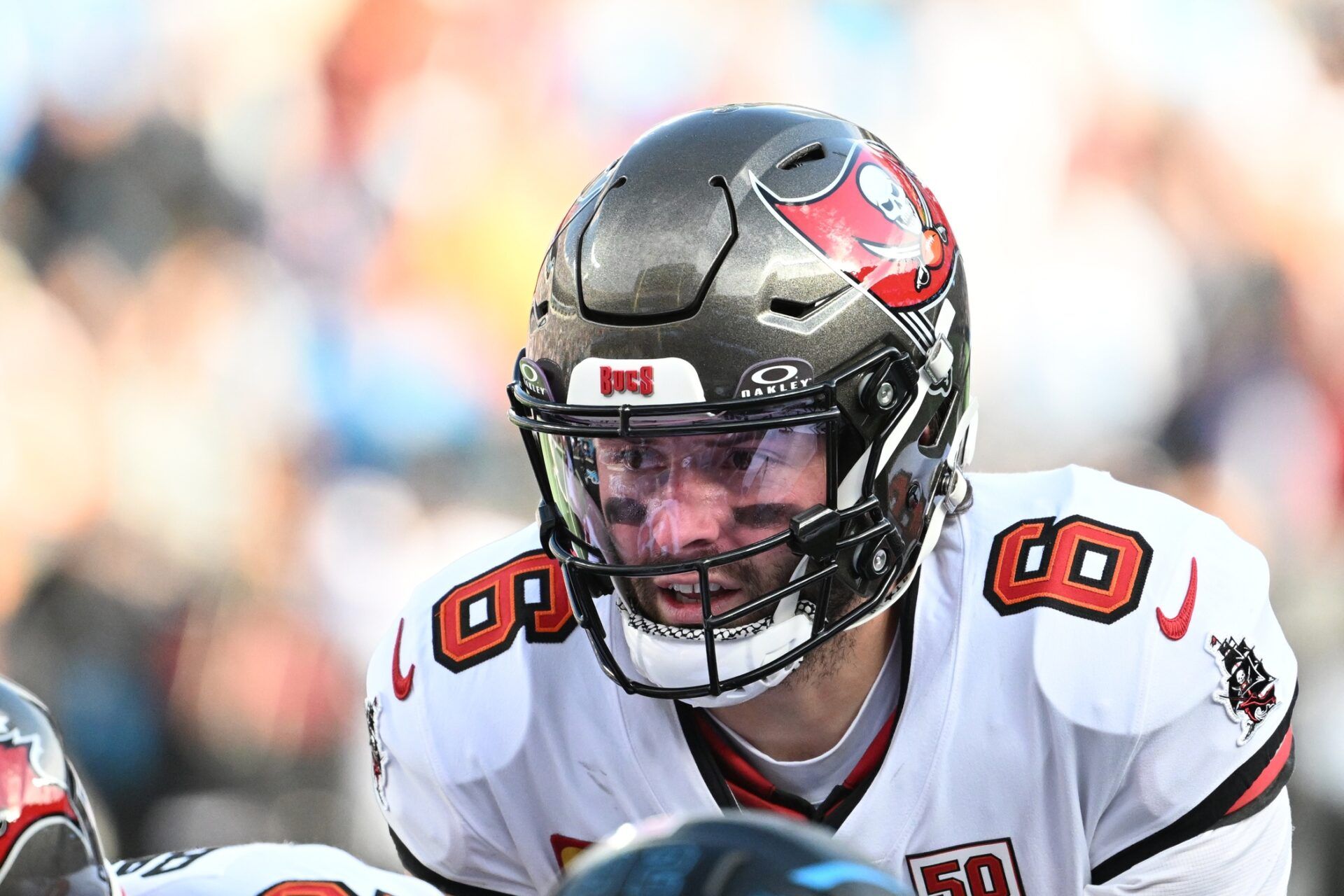 Tampa Bay Buccaneers quarterback Baker Mayfield (6) at the line of scrimmage in the third quarter at Bank of America Stadium.
