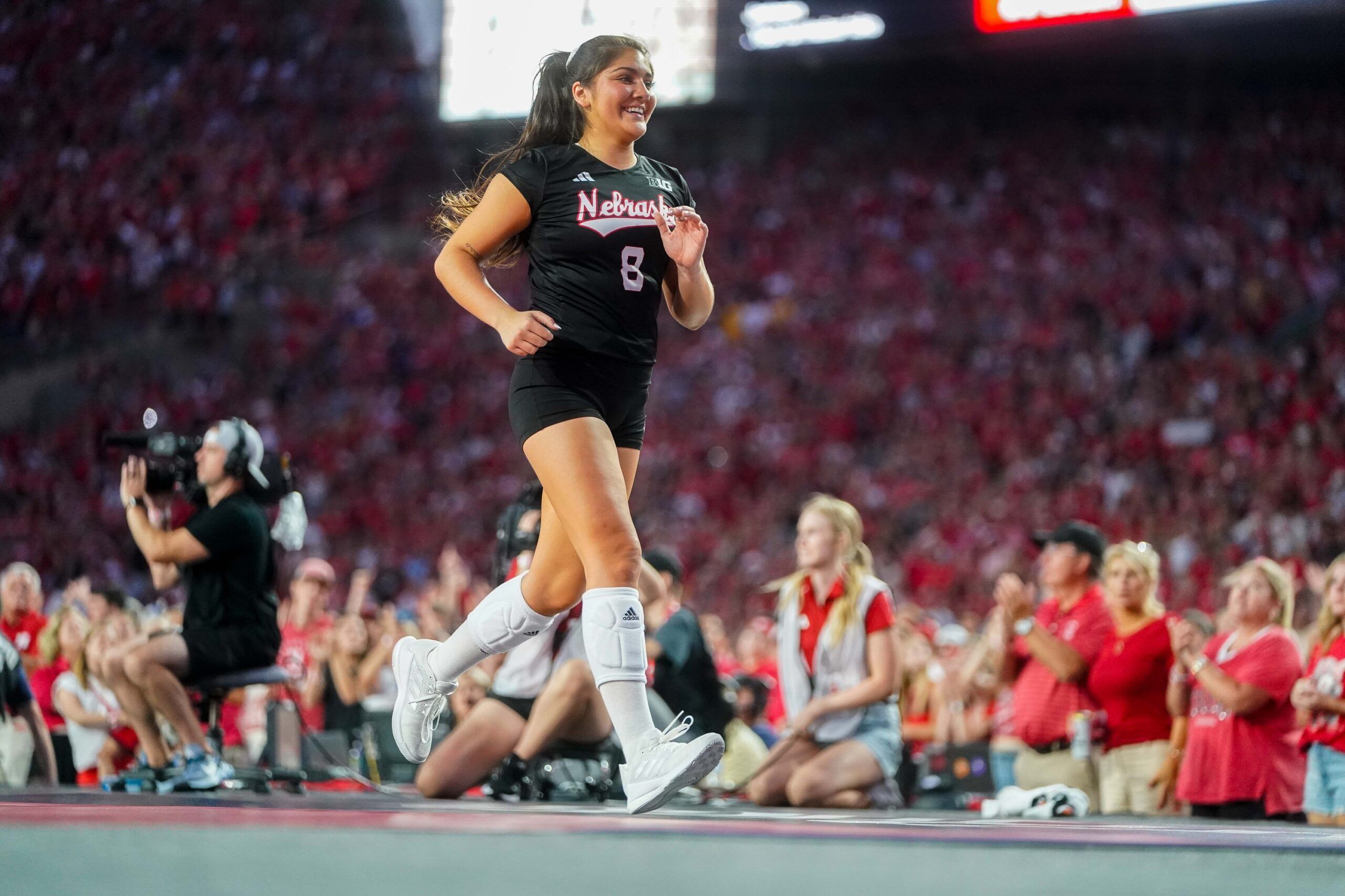 Nebraska Cornhuskers libero Lexi Rodriguez (8) after the second set against the Omaha Mavericks at Memorial Stadium.