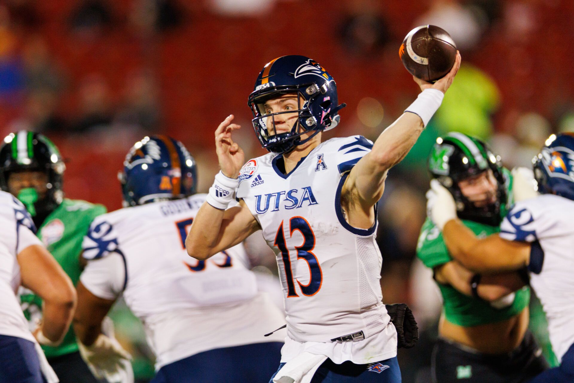 UTSA Roadrunners quarterback Owen McCown (13) throws a pass during the first quarter against the Marshall Thundering Herd at Toyota Stadium.