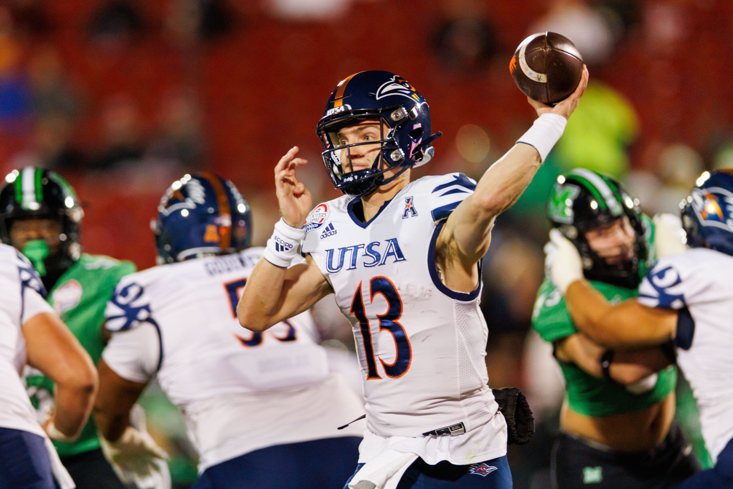 UTSA Roadrunners quarterback Owen McCown (13) throws a pass during the first quarter against the Marshall Thundering Herd at Toyota Stadium.