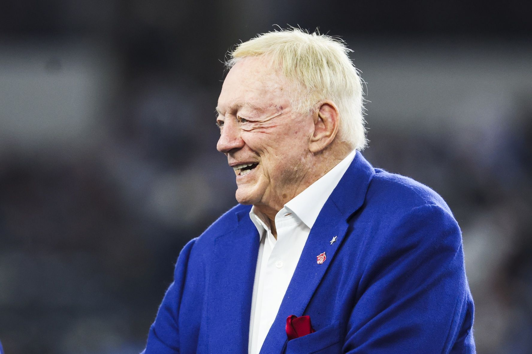 Dallas Cowboys owner Jerry Jones stands on the field during pregame warmups against the Los Angeles Chargers at AT&T Stadium.