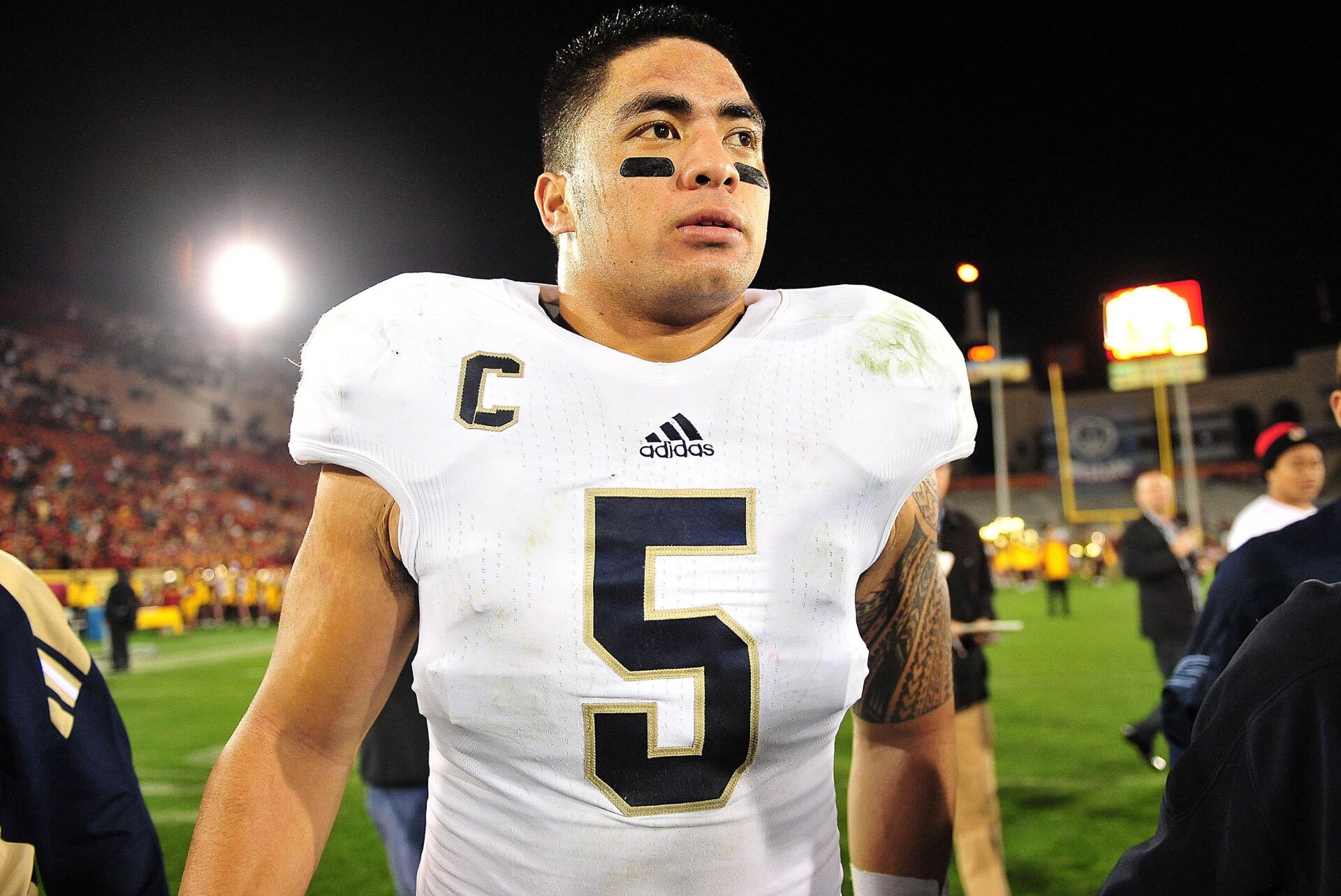 Notre Dame Fighting Irish linebacker Manti Te'o (5) after the 22-13 victory against the Southern California Trojans during the second half at the Los Angeles Memorial Coliseum.