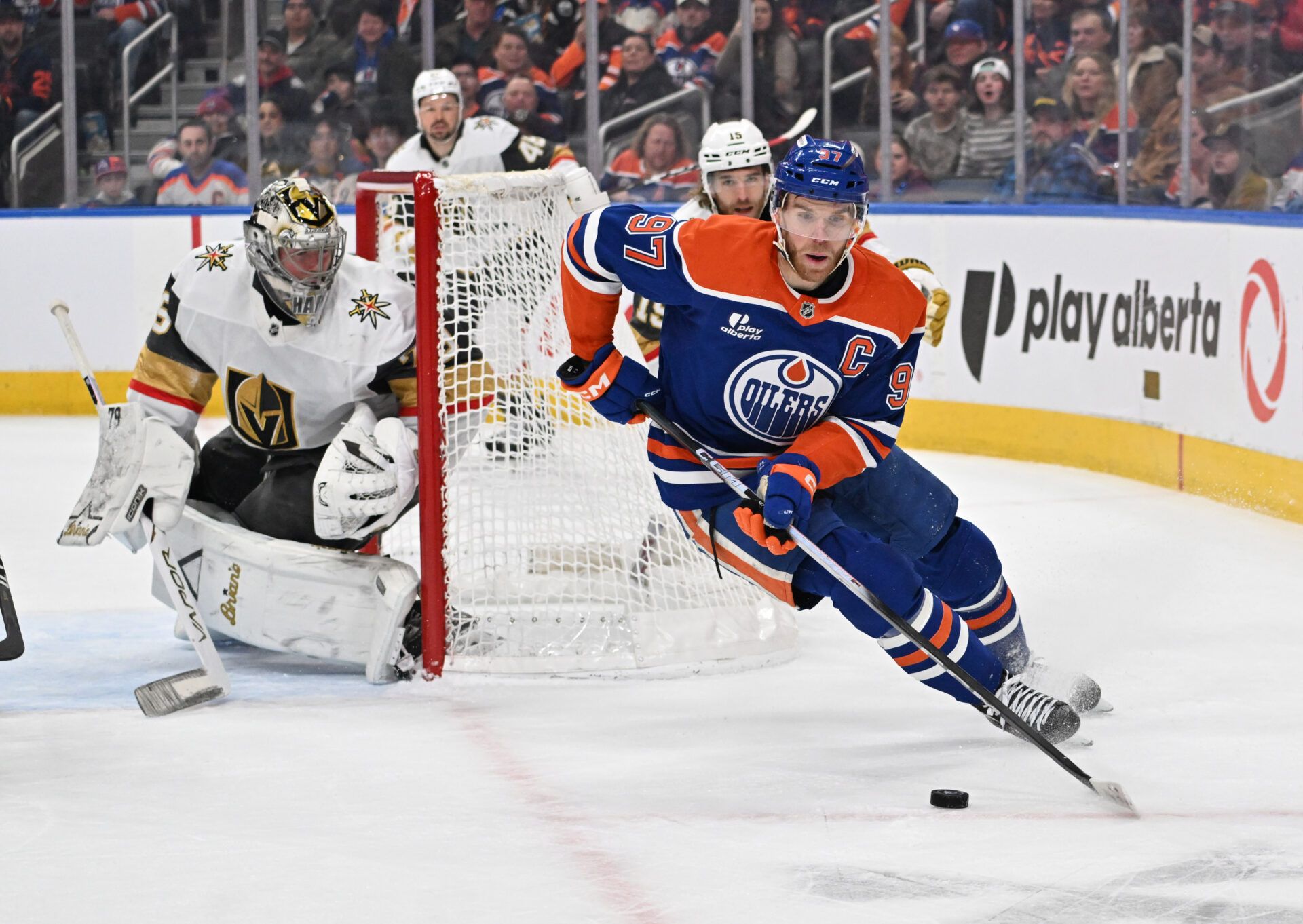 Edmonton Oilers center Connor McDavid (97) with Vegas Golden Knights goalie Carter Hart (79) are seen out on the ice during the first period at Rogers Place.